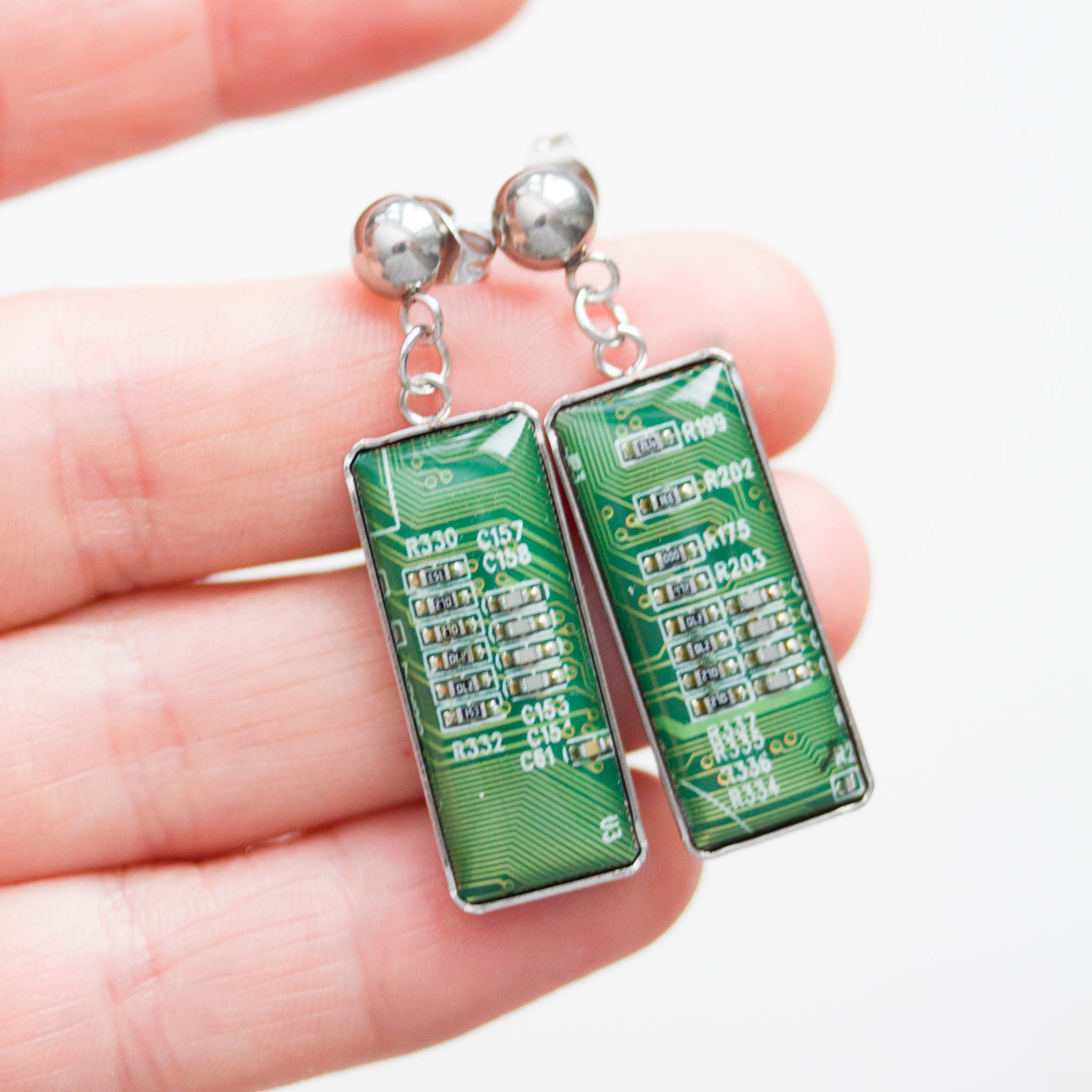 Stud / dangle earrings with rectangular circuit board pendants, steel wires
