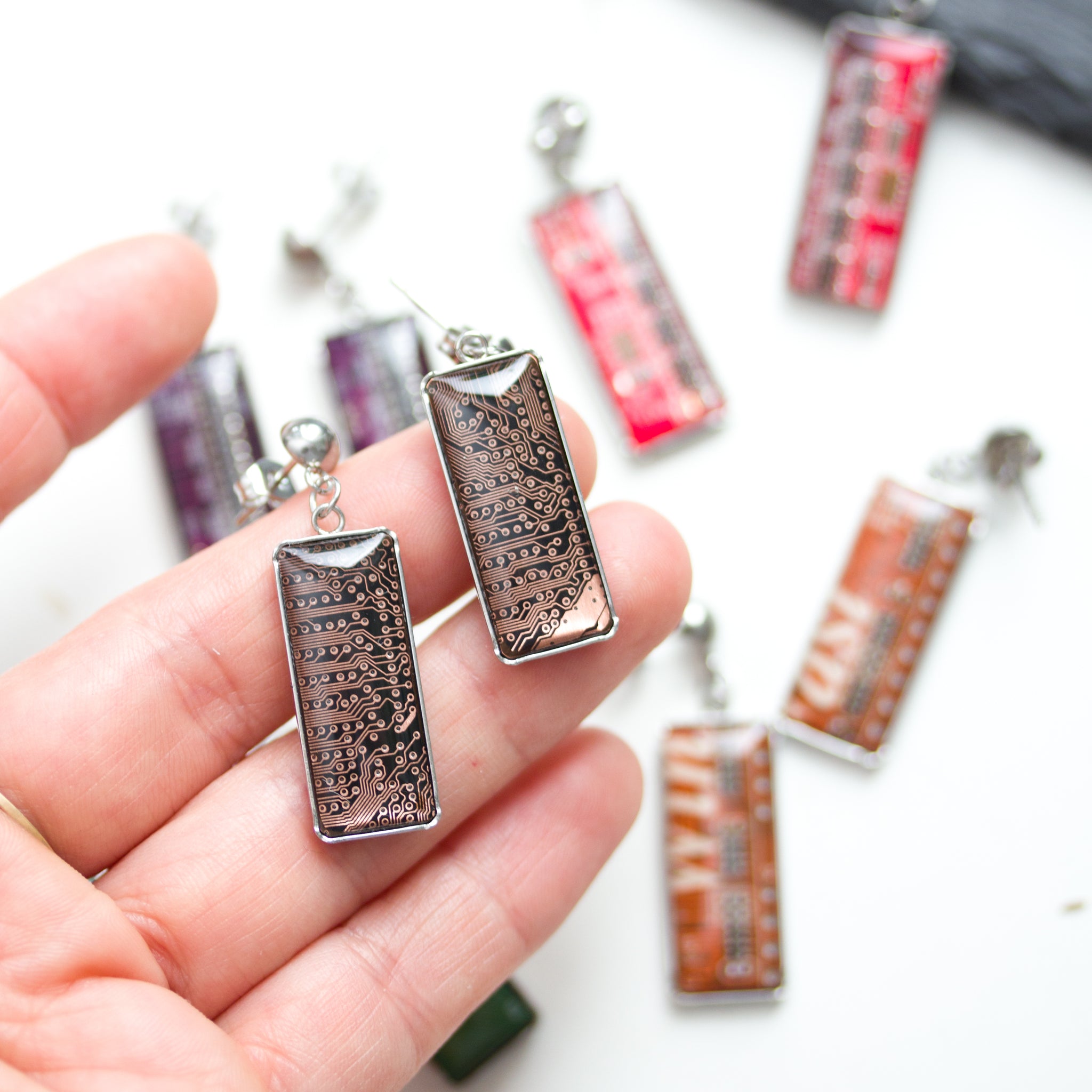 Stud / dangle earrings with rectangular circuit board pendants, steel wires
