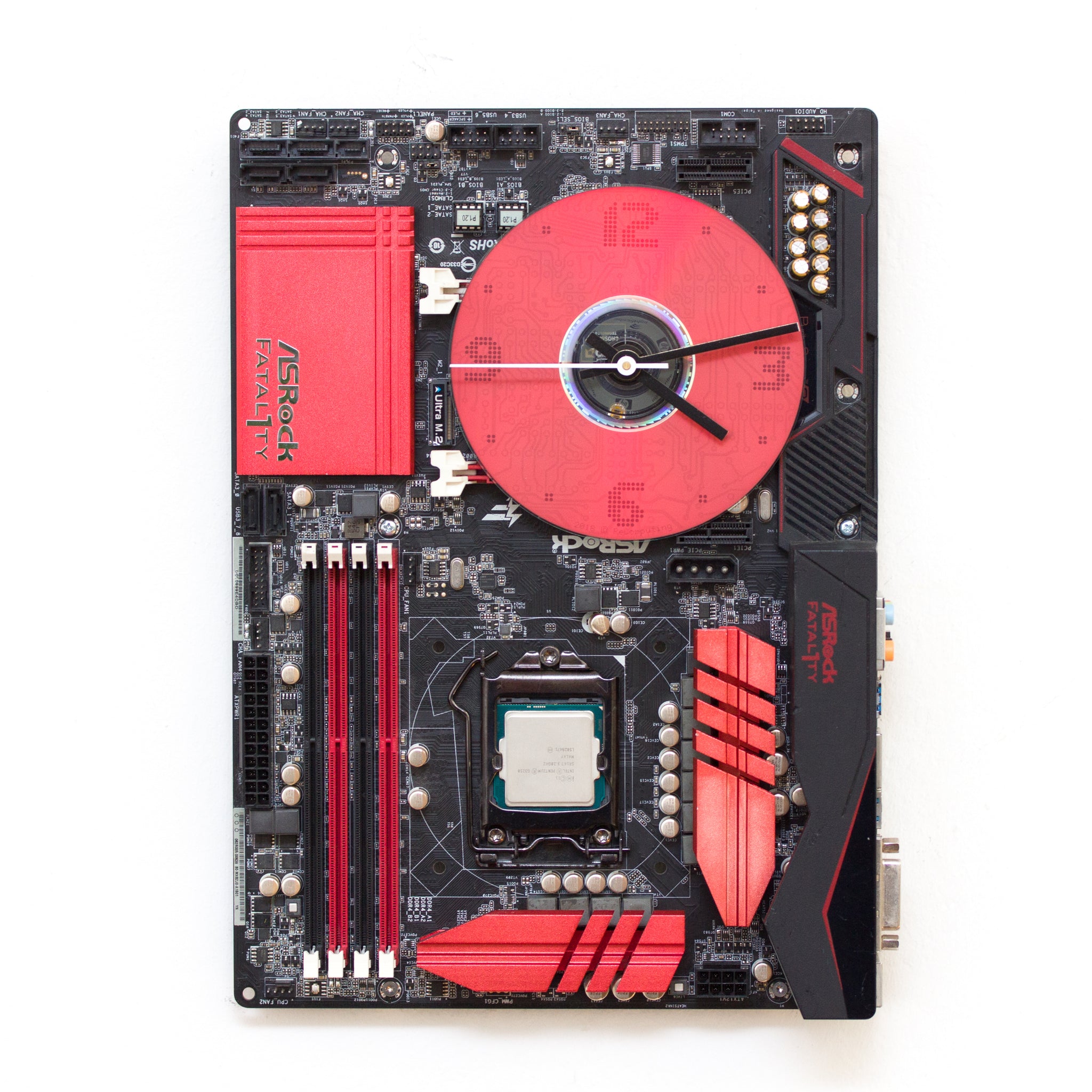 Wall Clock made of a black / dark brown circuit board with a red clock face