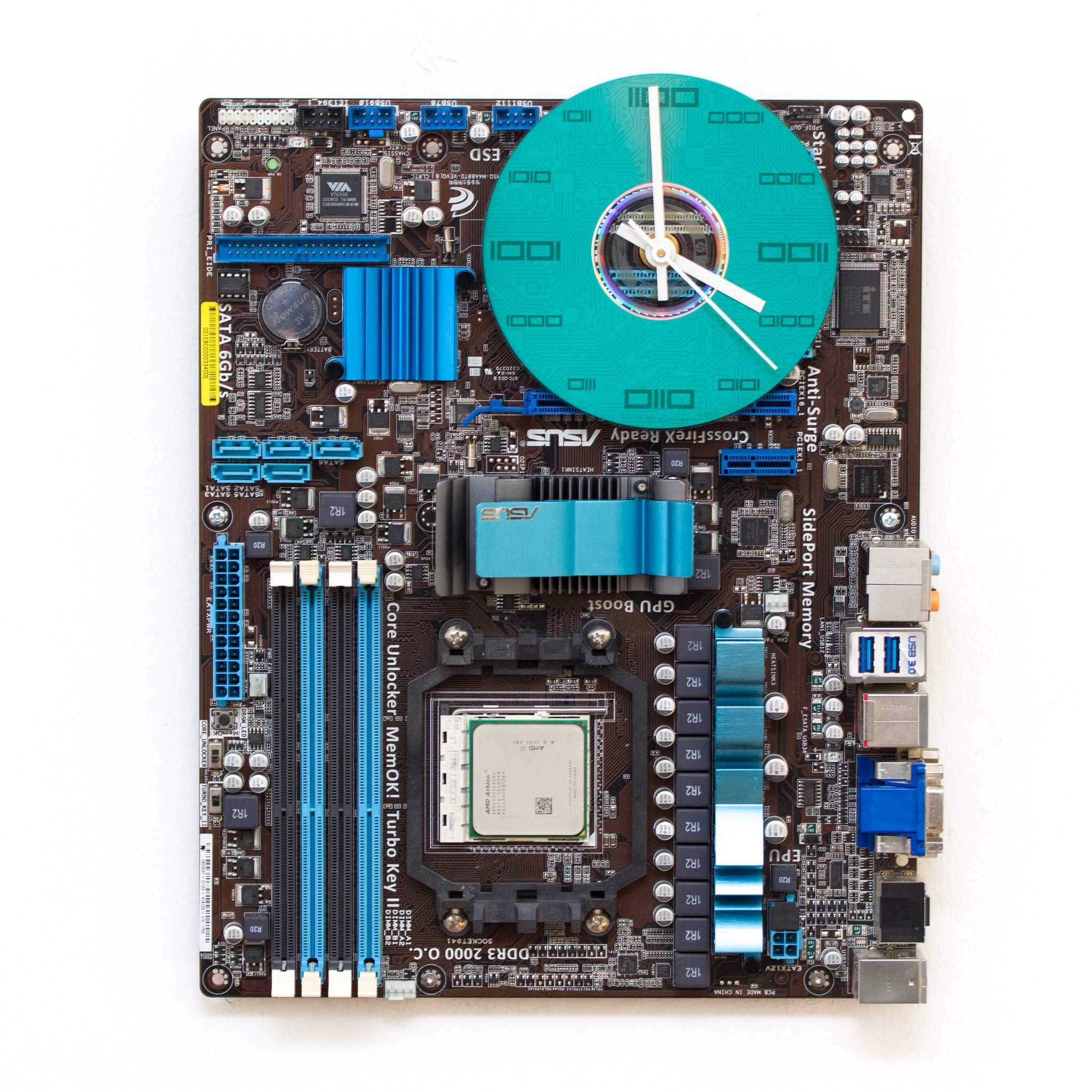 Geeky Wall Clock made of a black / dark brown circuit board with a blue clock face