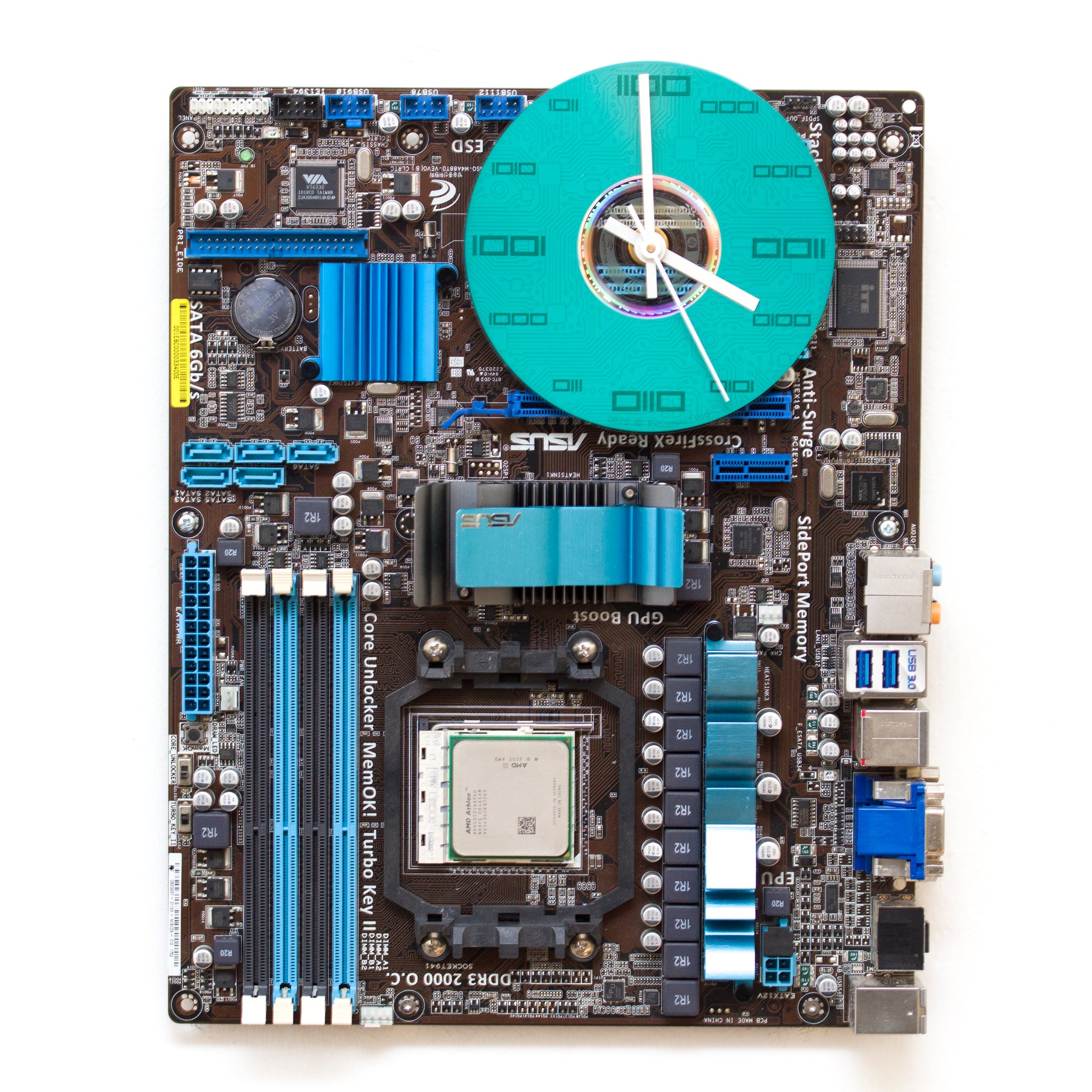 Geeky Wall Clock made of a black / dark brown circuit board with a blue clock face