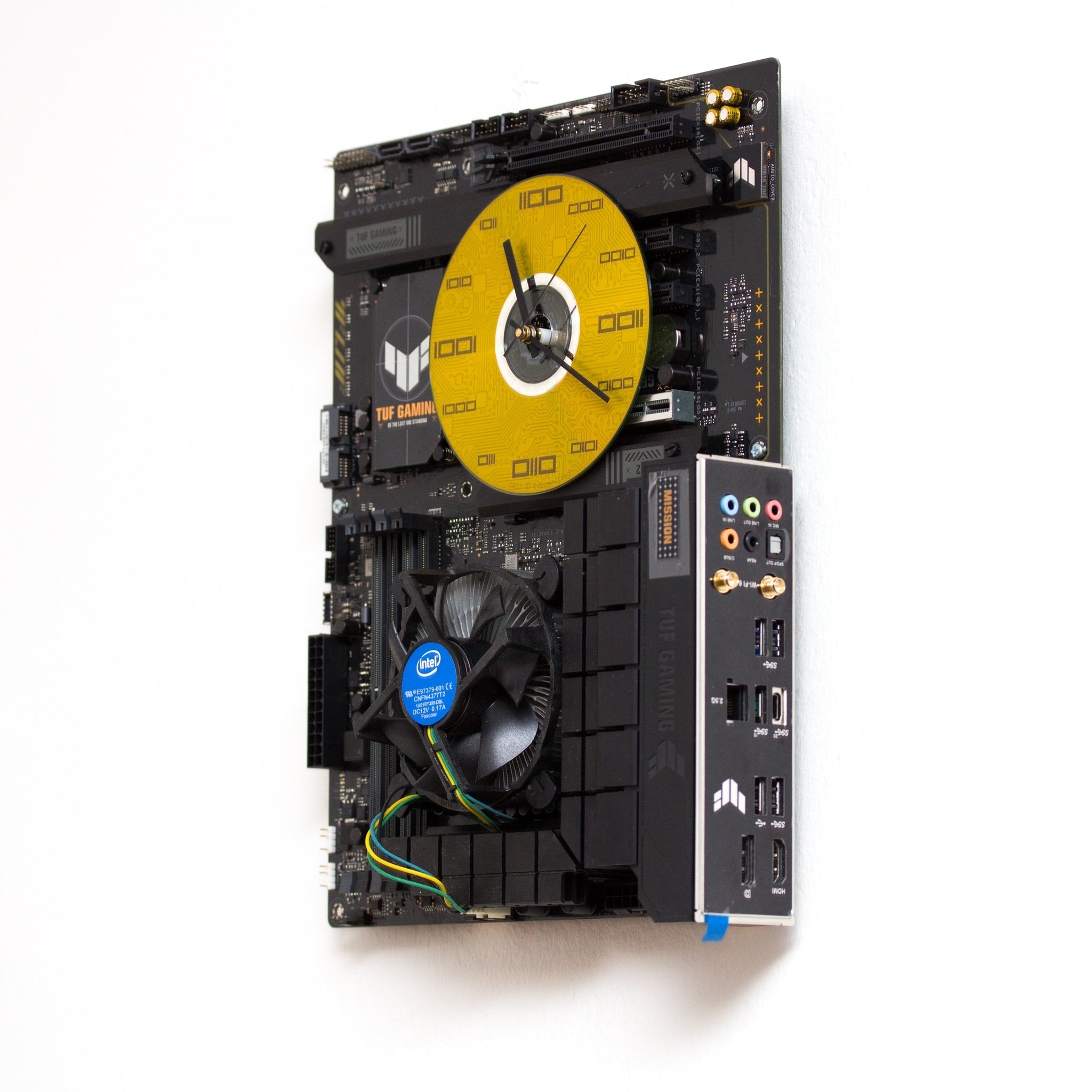 Geeky Wall Clock made of black / dark brown circuit board with yellow clock face