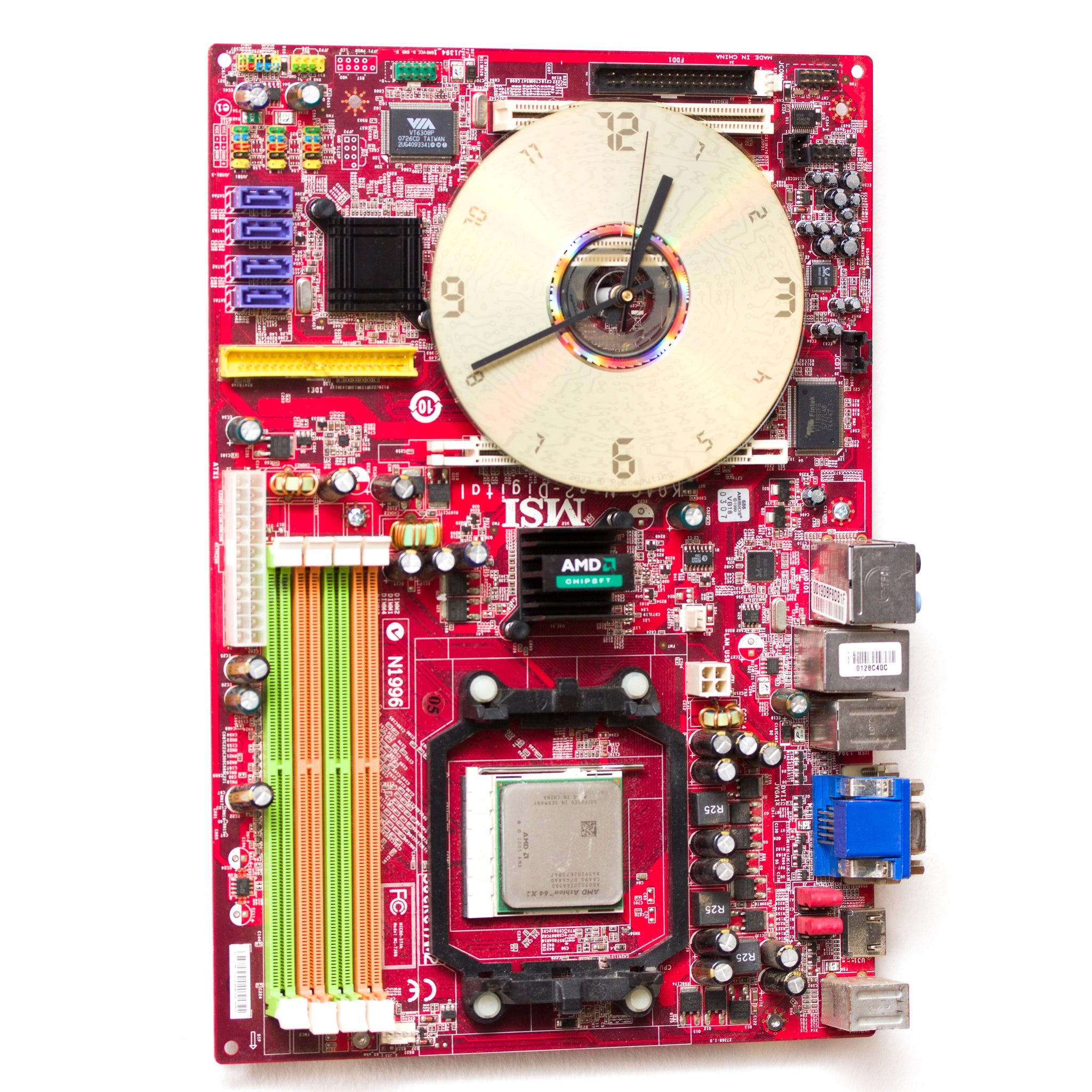 Wall Clock made of red computer motherboard