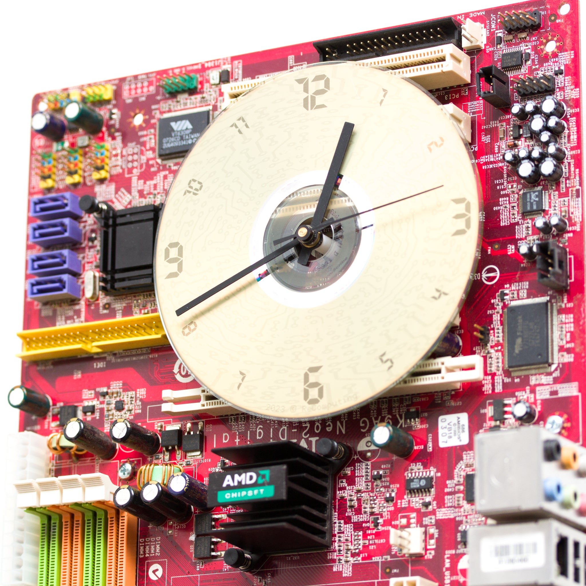 Wall Clock made of red computer motherboard