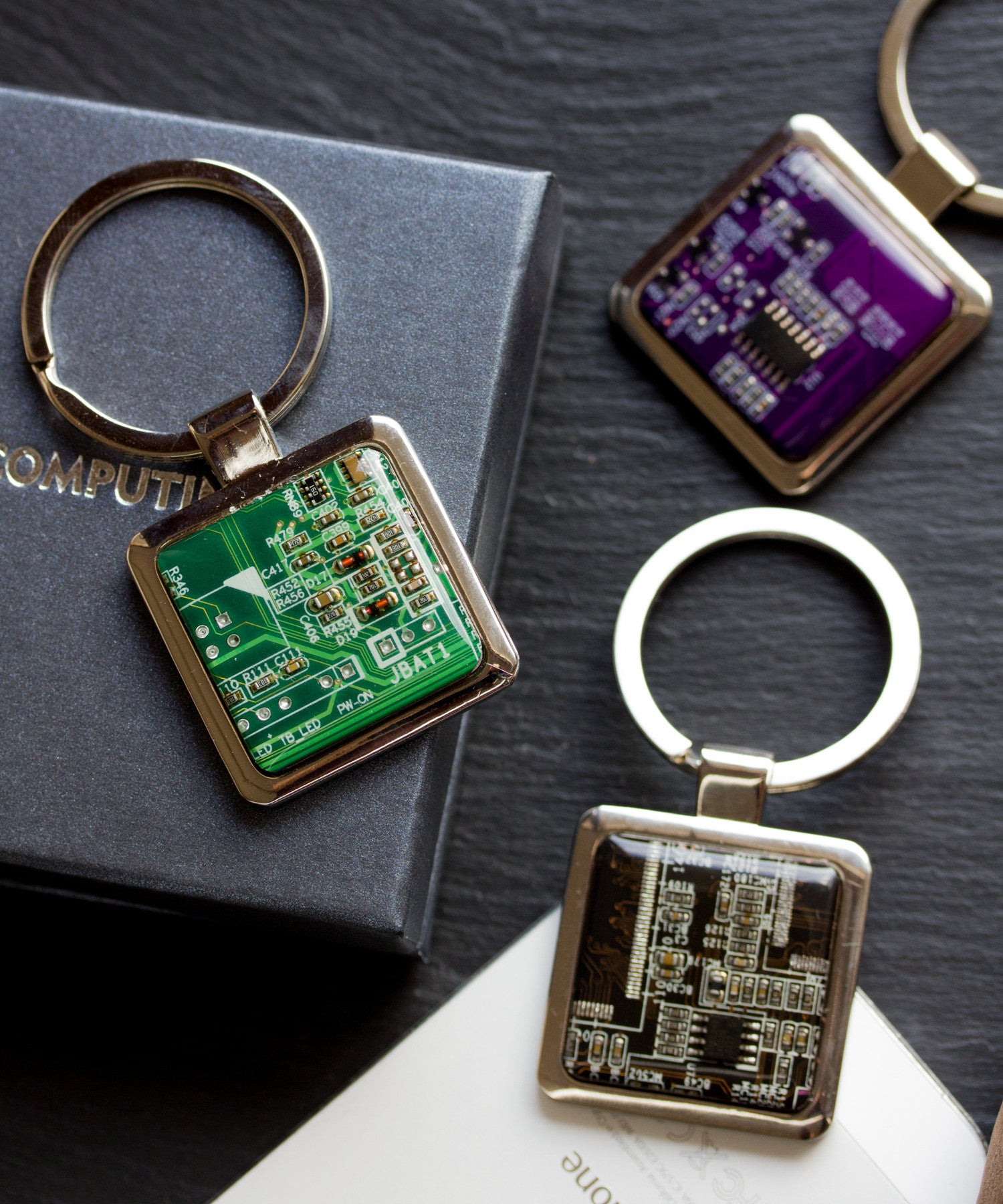 Unique keychain with circuit board piece