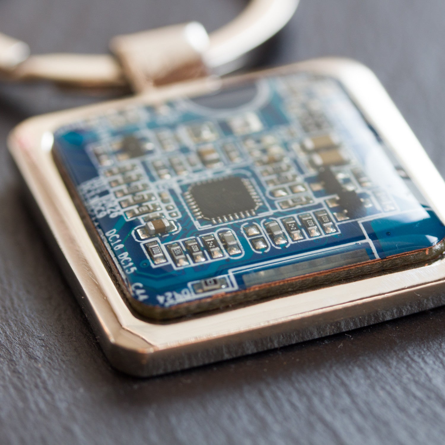 Unique keychain with circuit board piece