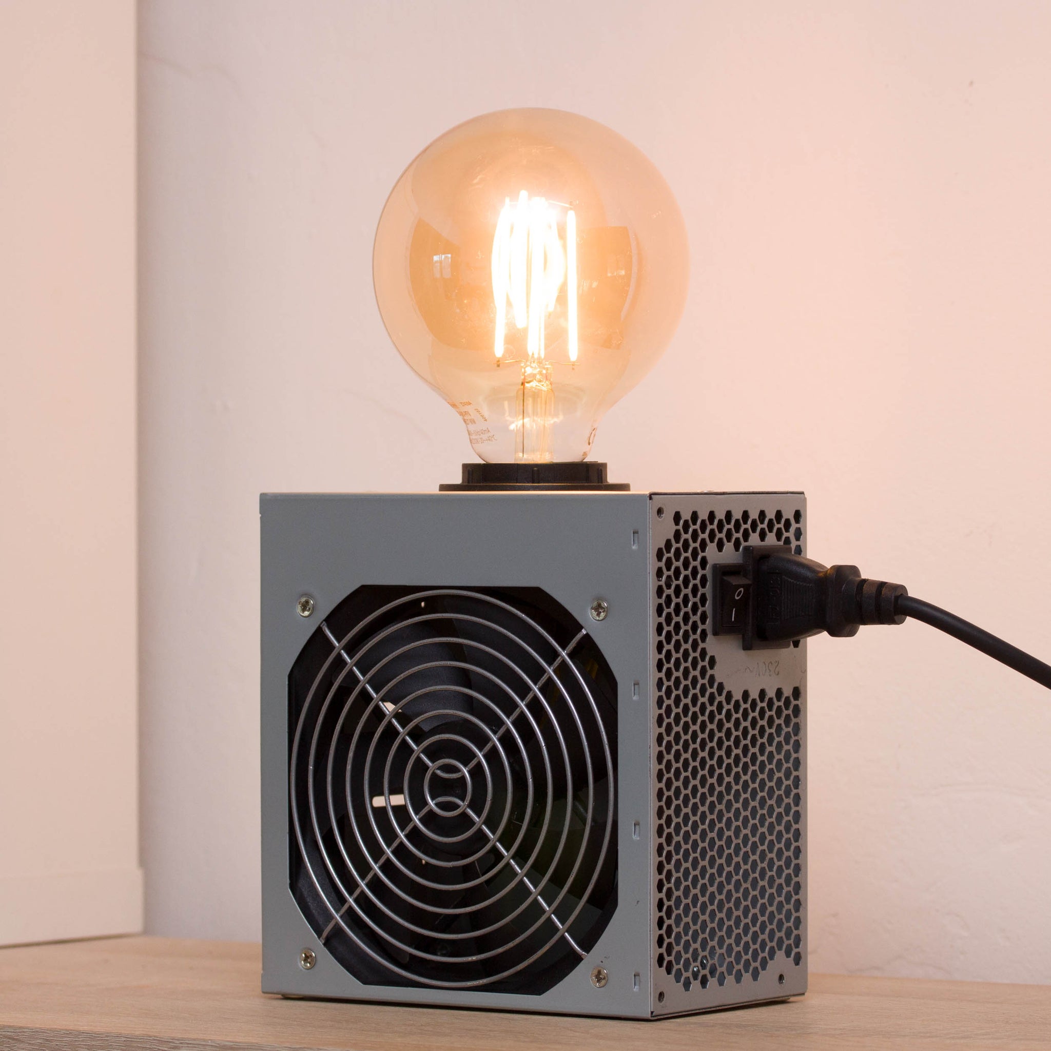 Table lamp made with recycled computer power supply unit