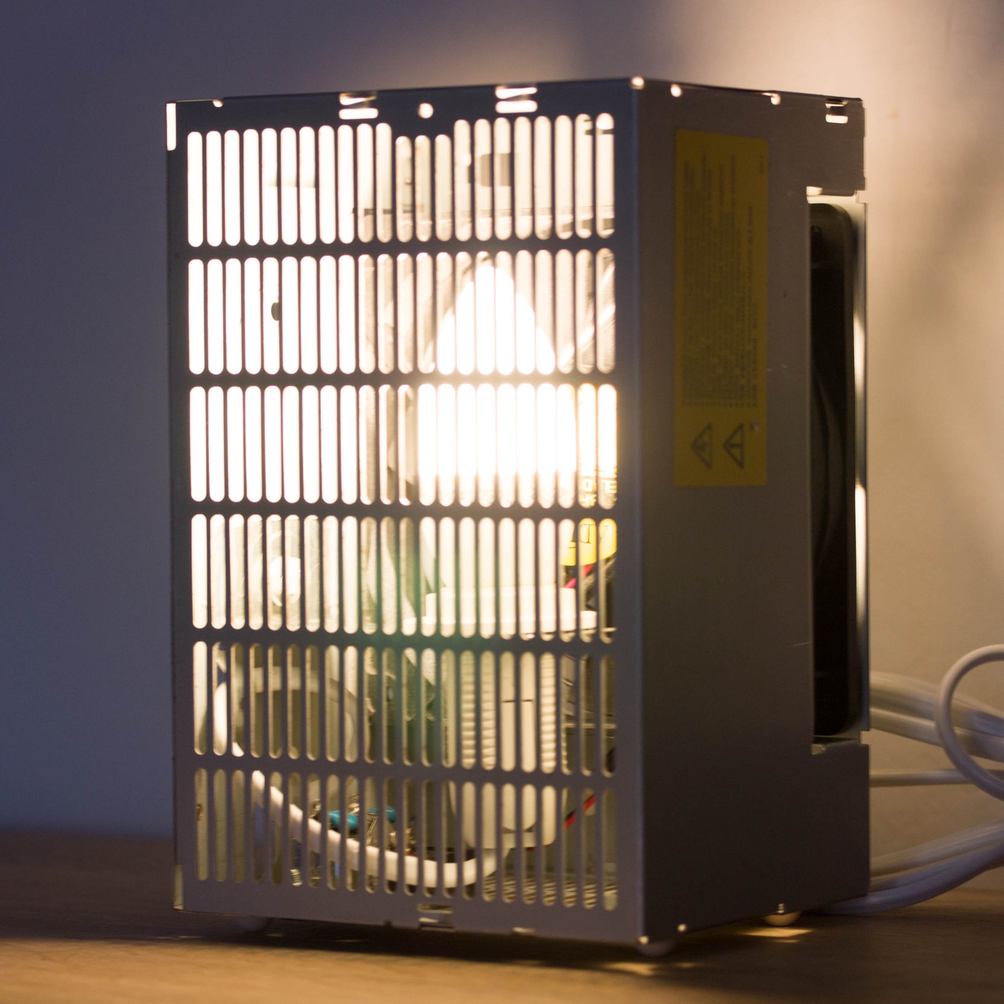 Table lamp made with recycled computer power supply unit