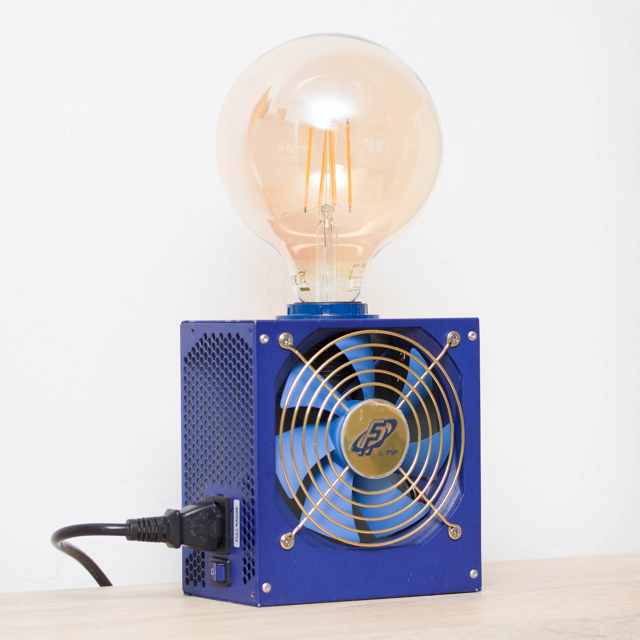Table lamp made with recycled computer power supply unit