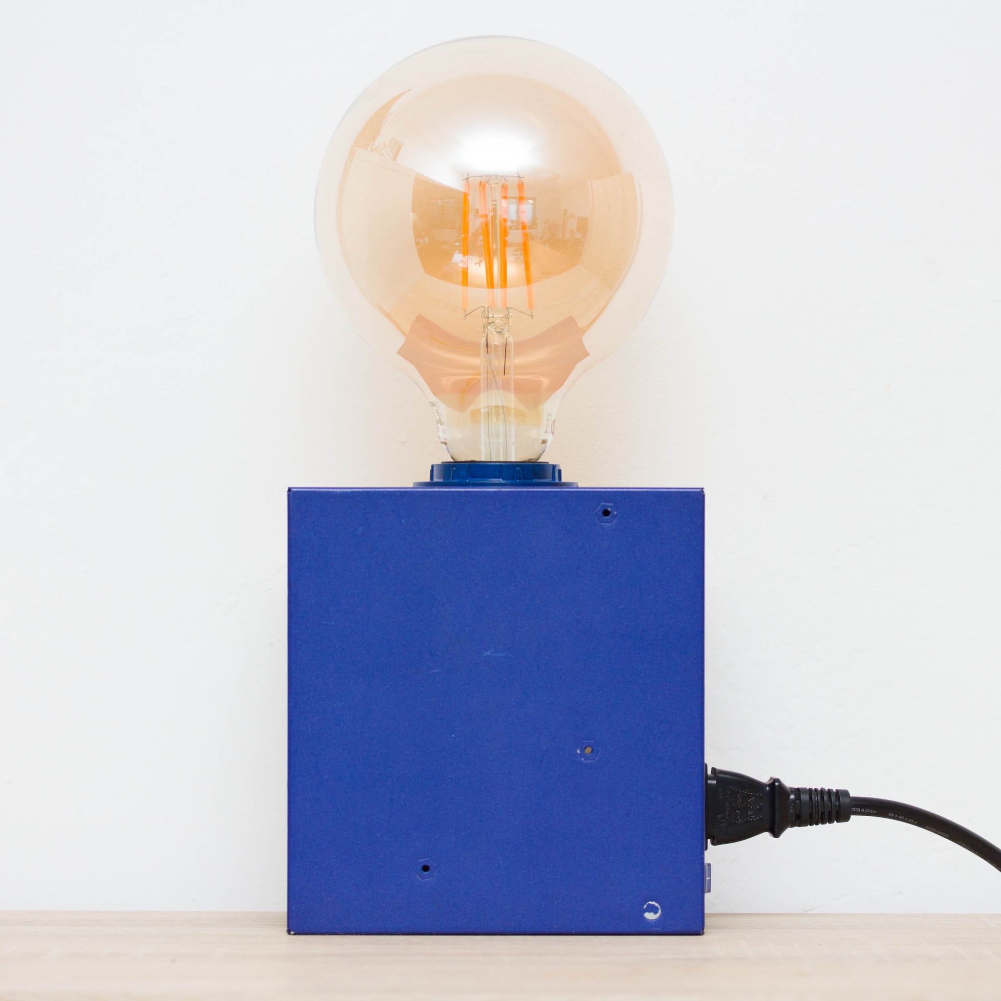 Table lamp made with recycled computer power supply unit