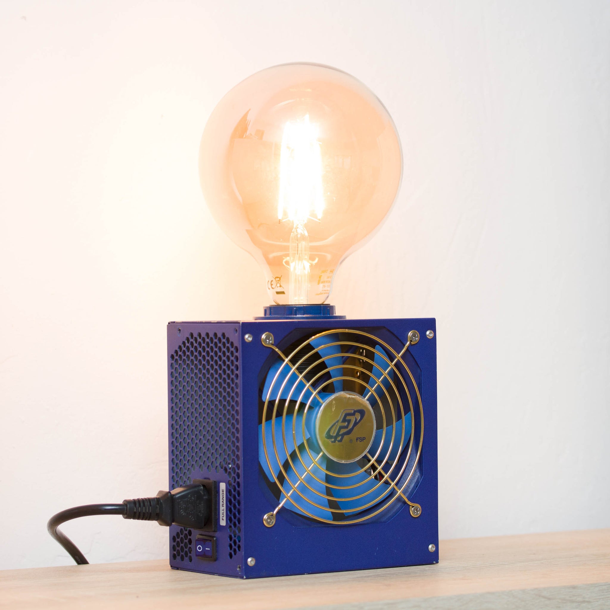 Table lamp made with recycled computer power supply unit