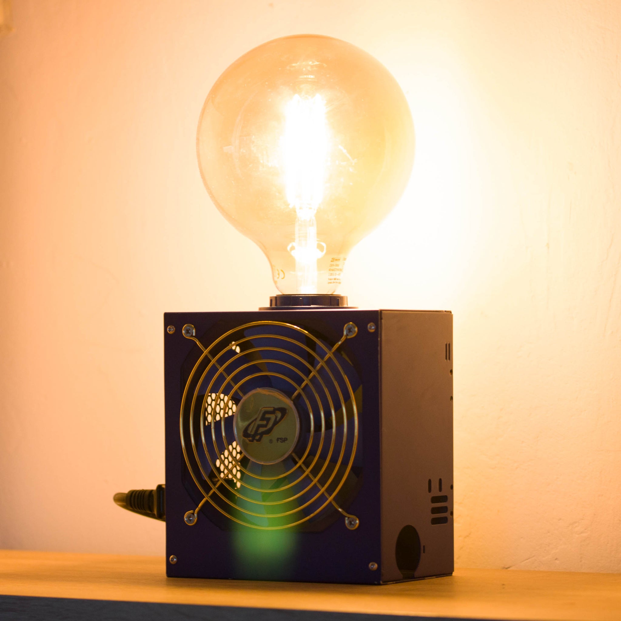 Table lamp made with recycled computer power supply unit