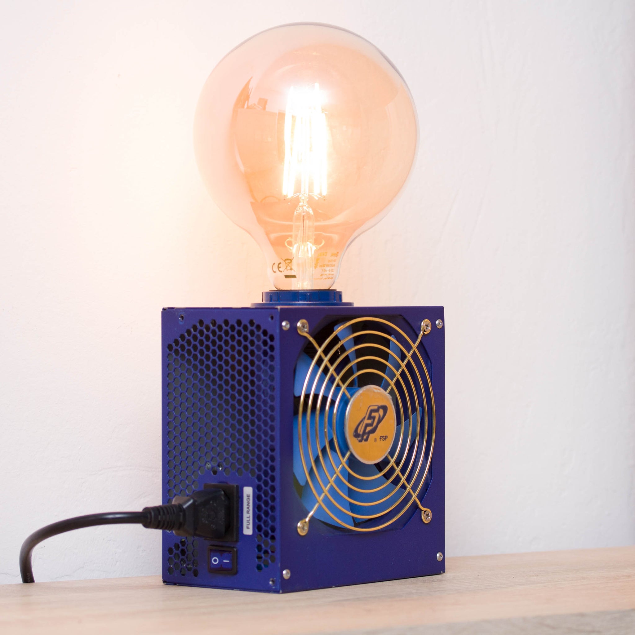 Table lamp made with recycled computer power supply unit