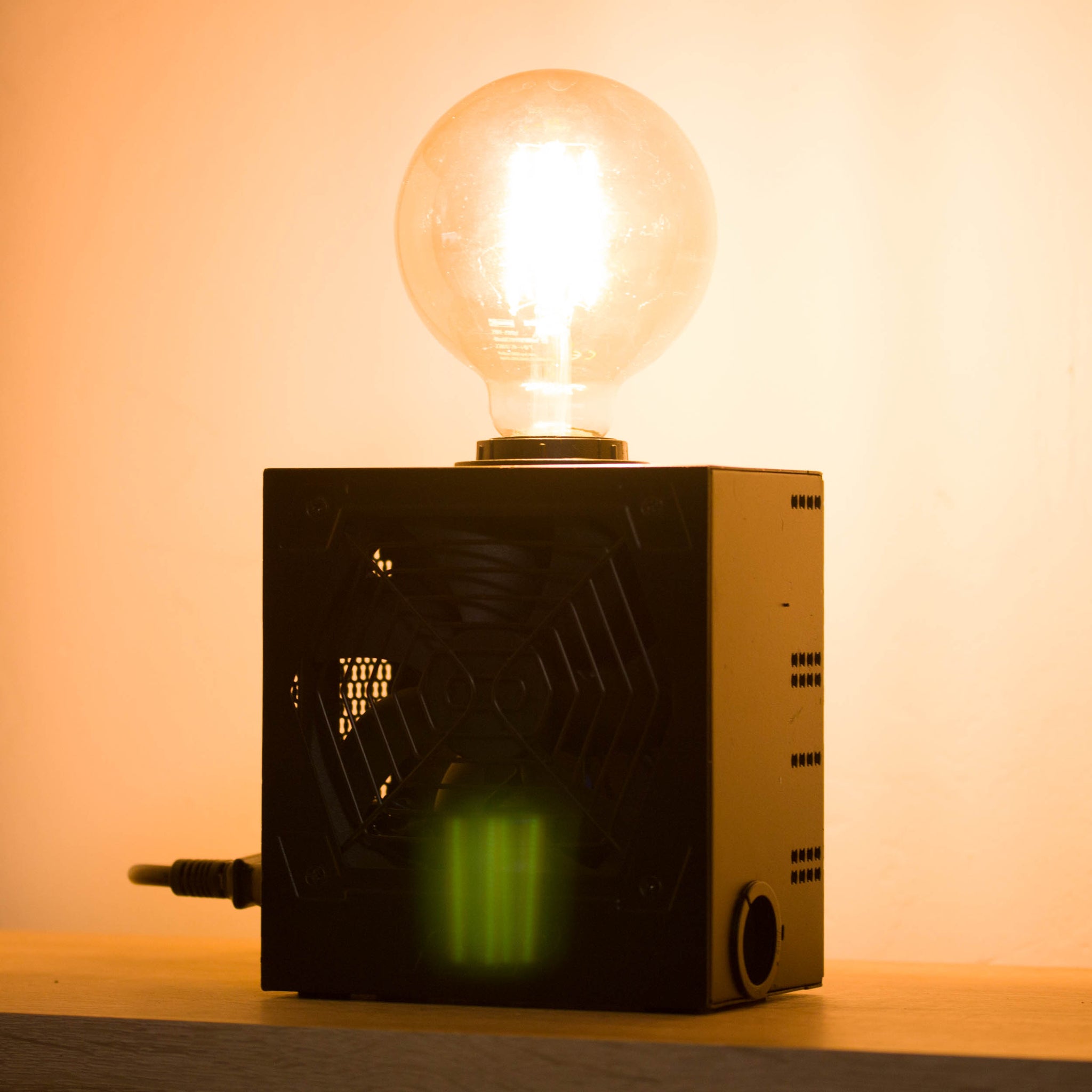 Table lamp made with recycled computer power supply unit