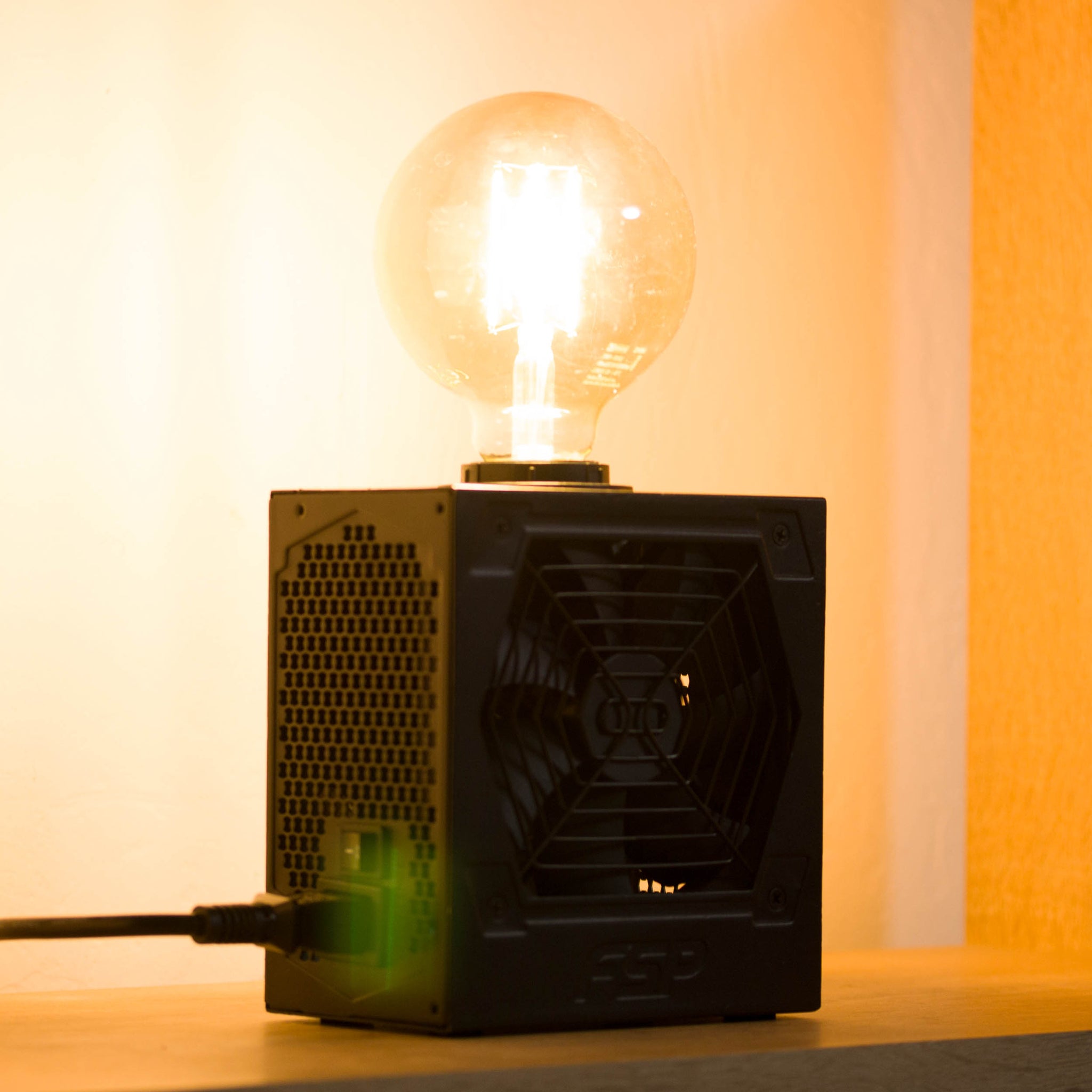 Table lamp made with recycled computer power supply unit