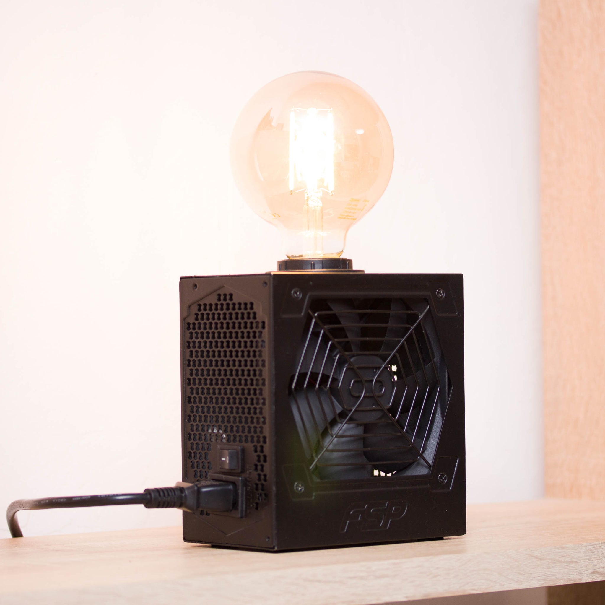 Table lamp made with recycled computer power supply unit