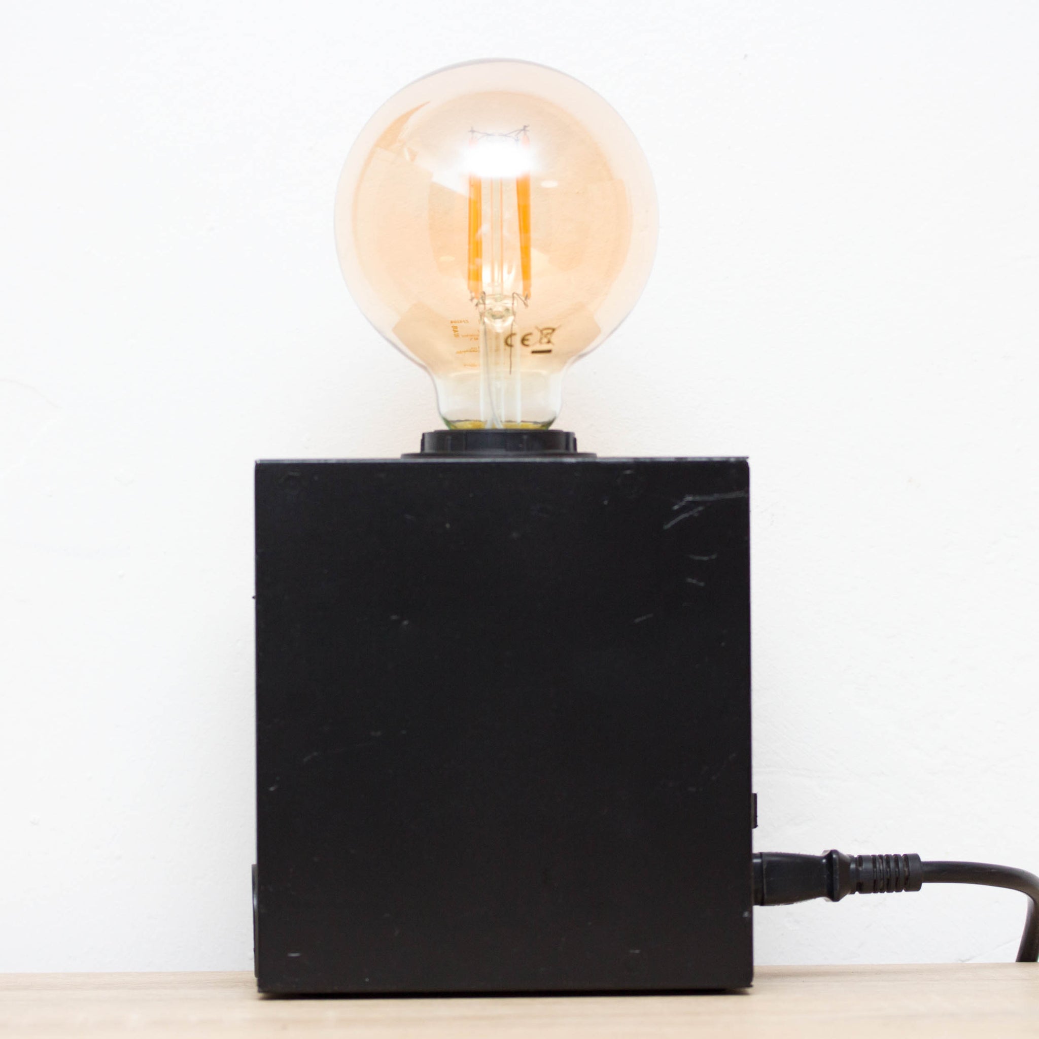Table lamp made with recycled computer power supply unit