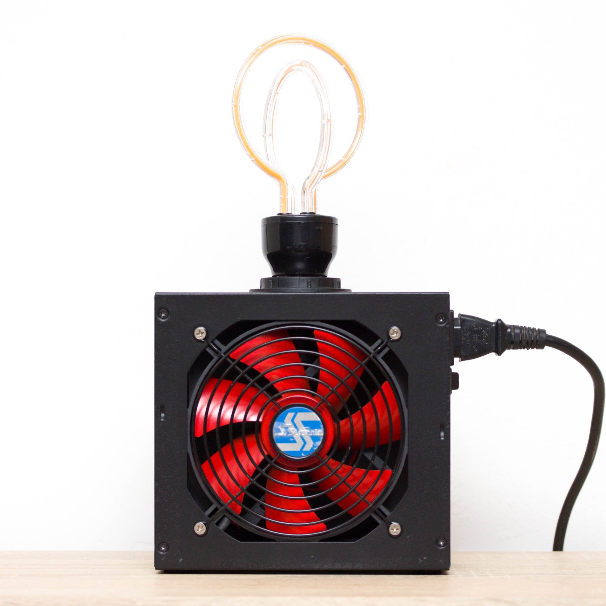 Table lamp made with recycled computer power supply unit