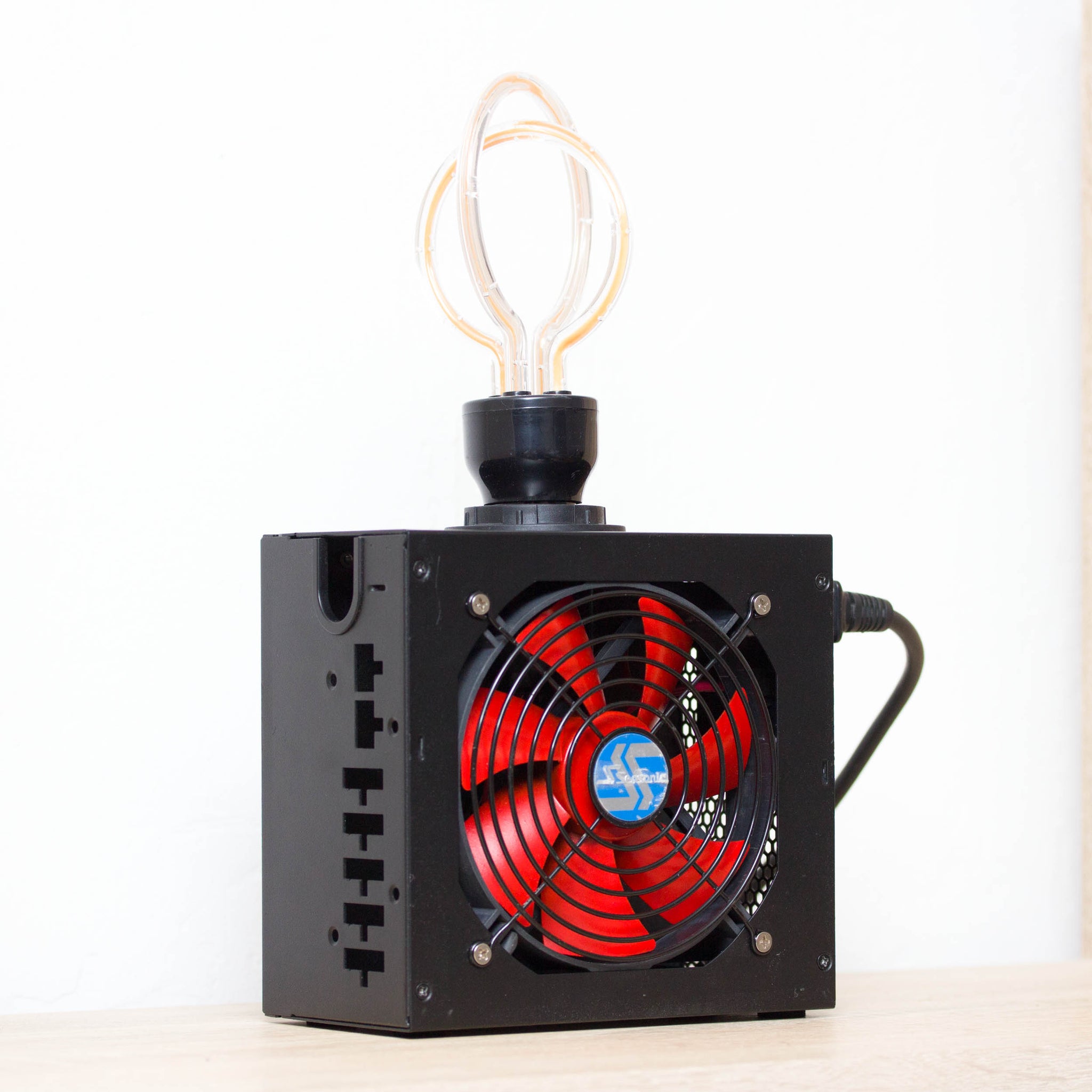 Table lamp made with recycled computer power supply unit