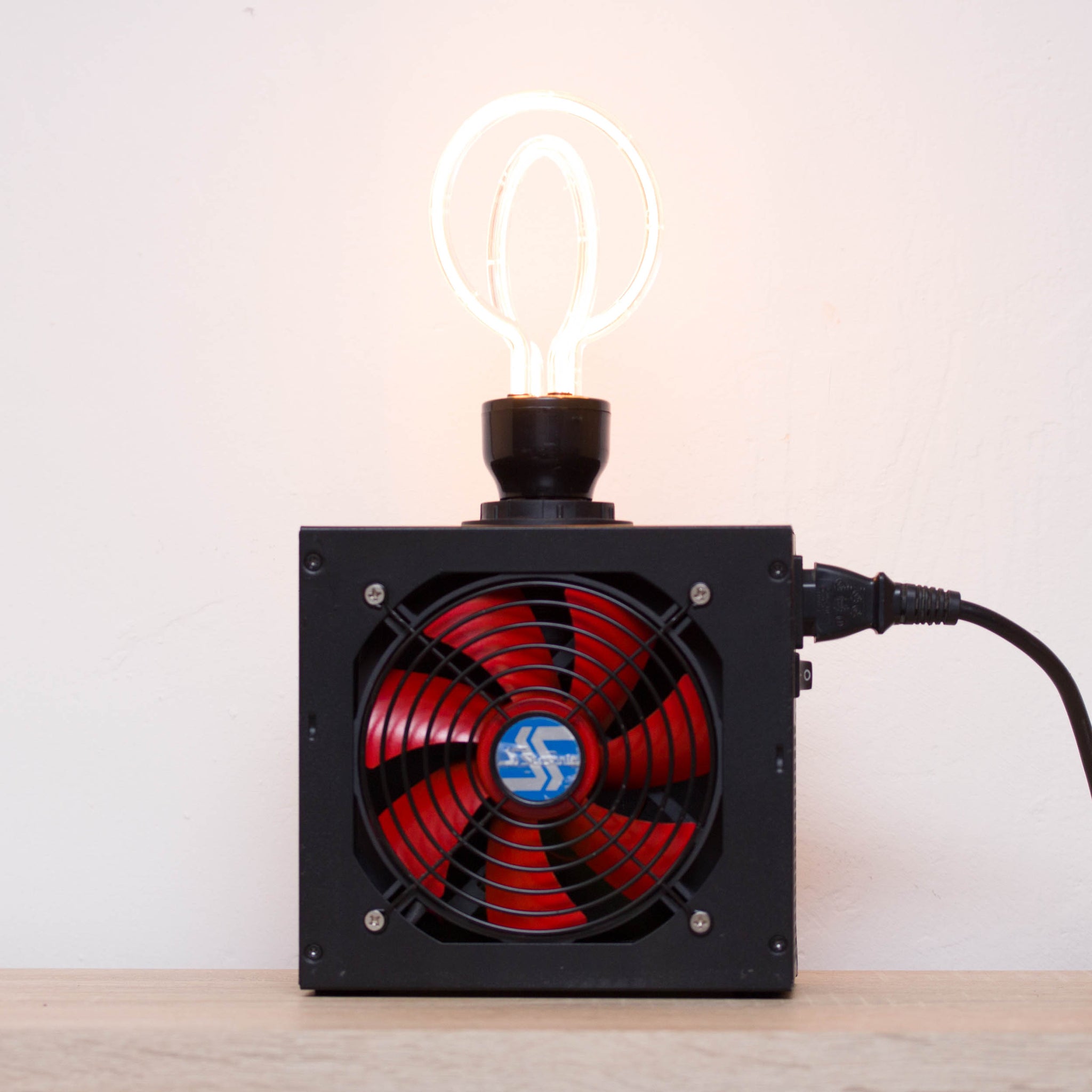 Table lamp made with recycled computer power supply unit