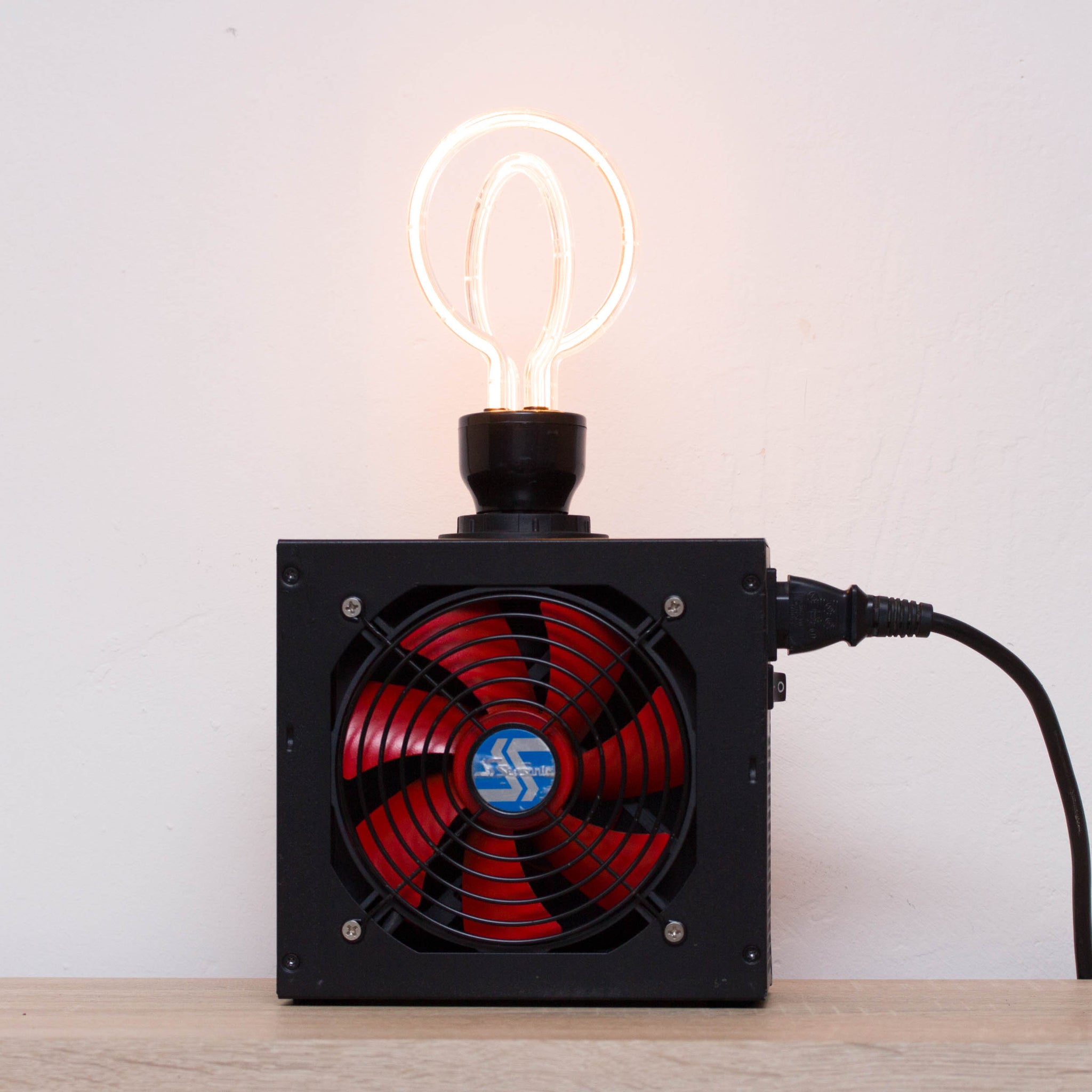 Table lamp made with recycled computer power supply unit