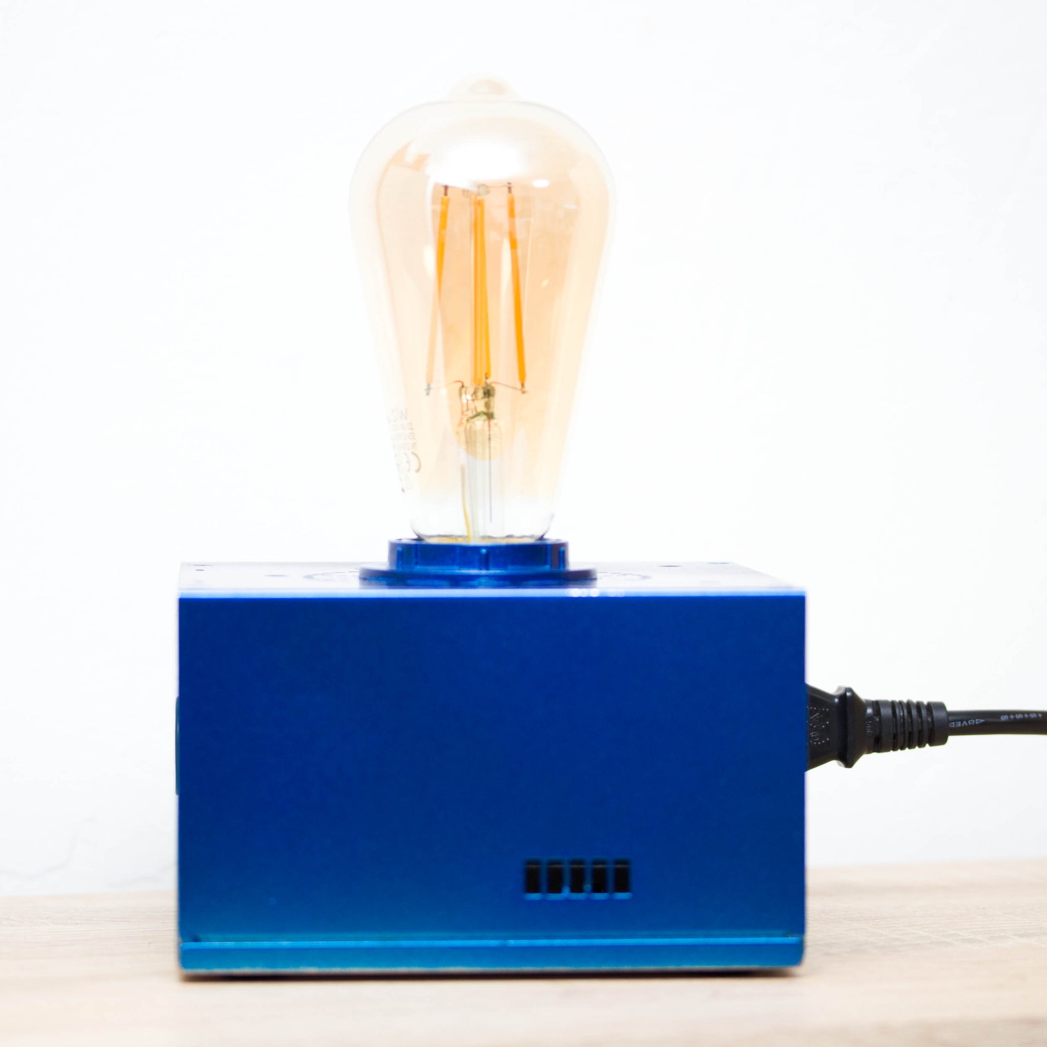Table lamp made with recycled computer power supply unit