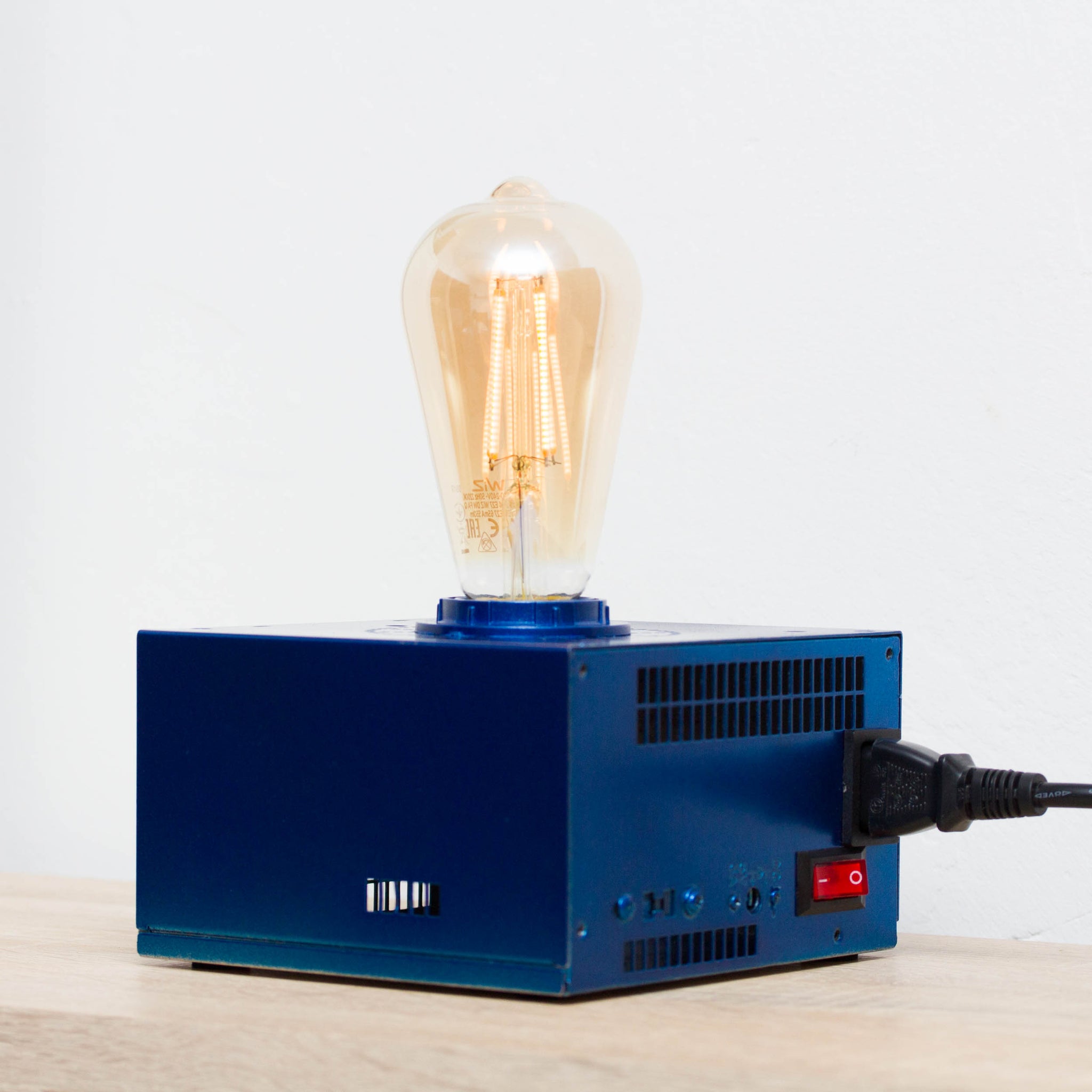 Table lamp made with recycled computer power supply unit