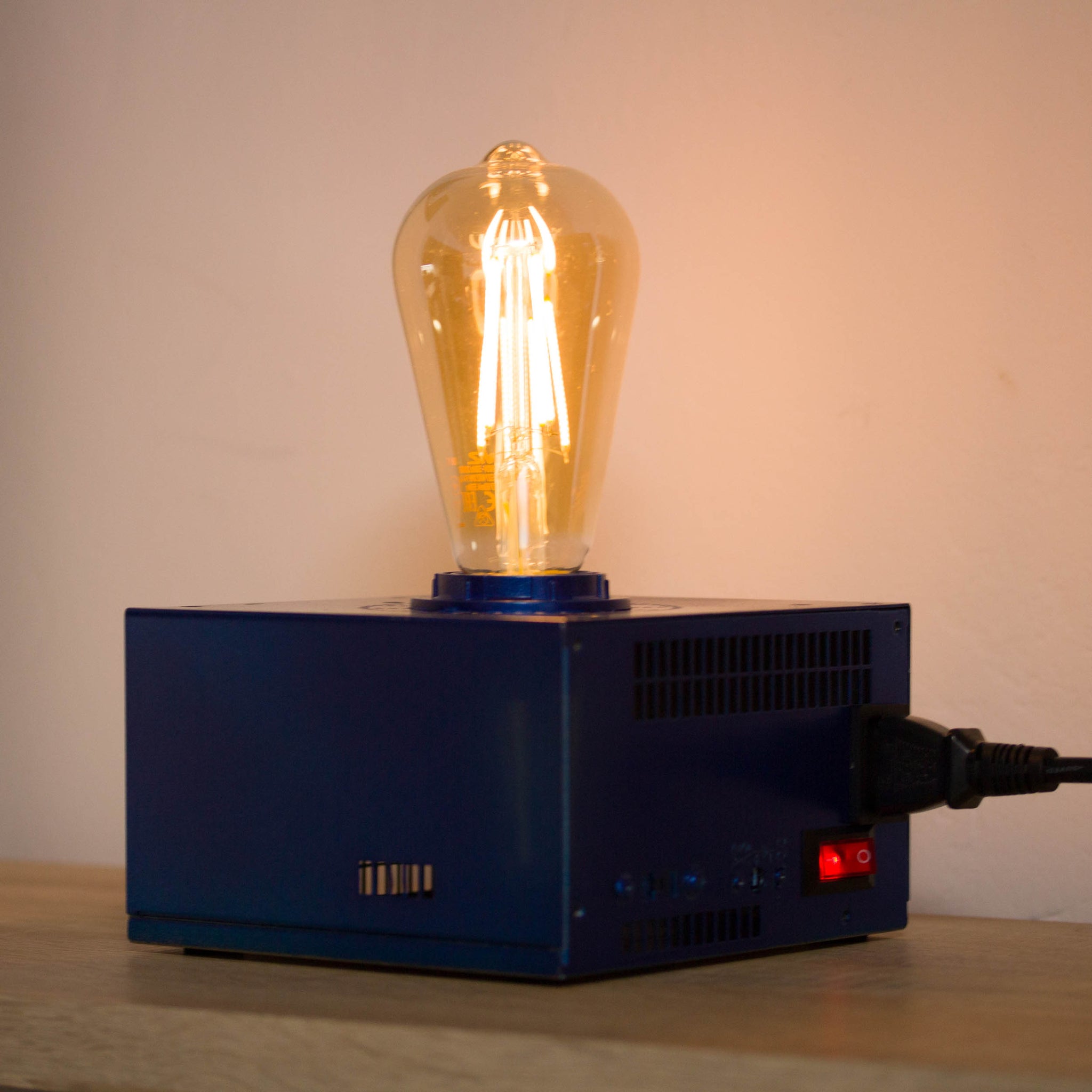 Table lamp made with recycled computer power supply unit