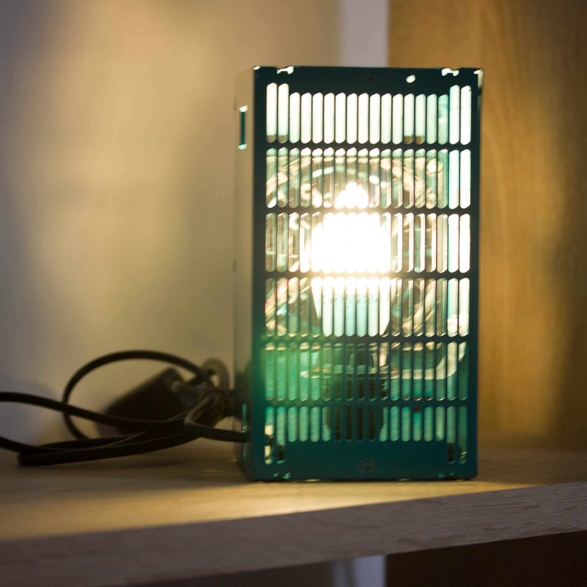 Table lamp made with recycled computer power supply unit