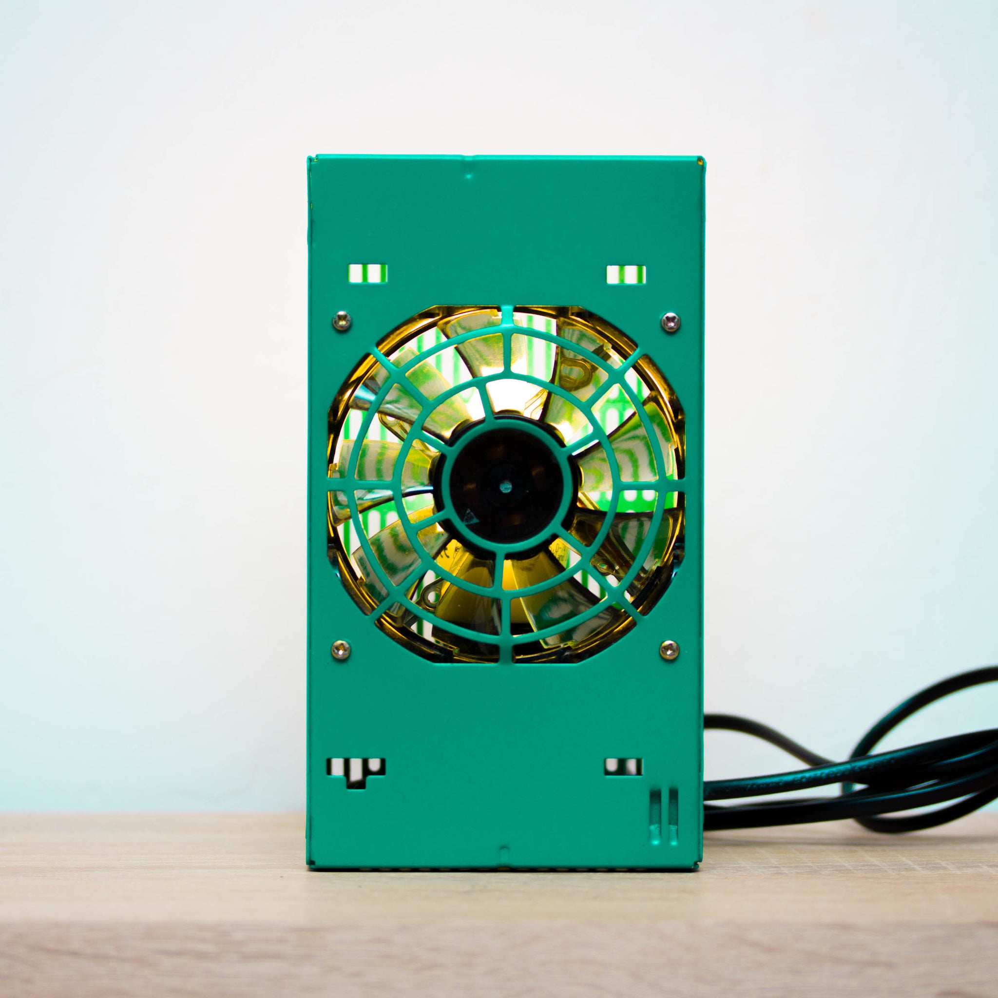 Table lamp made with recycled computer power supply unit