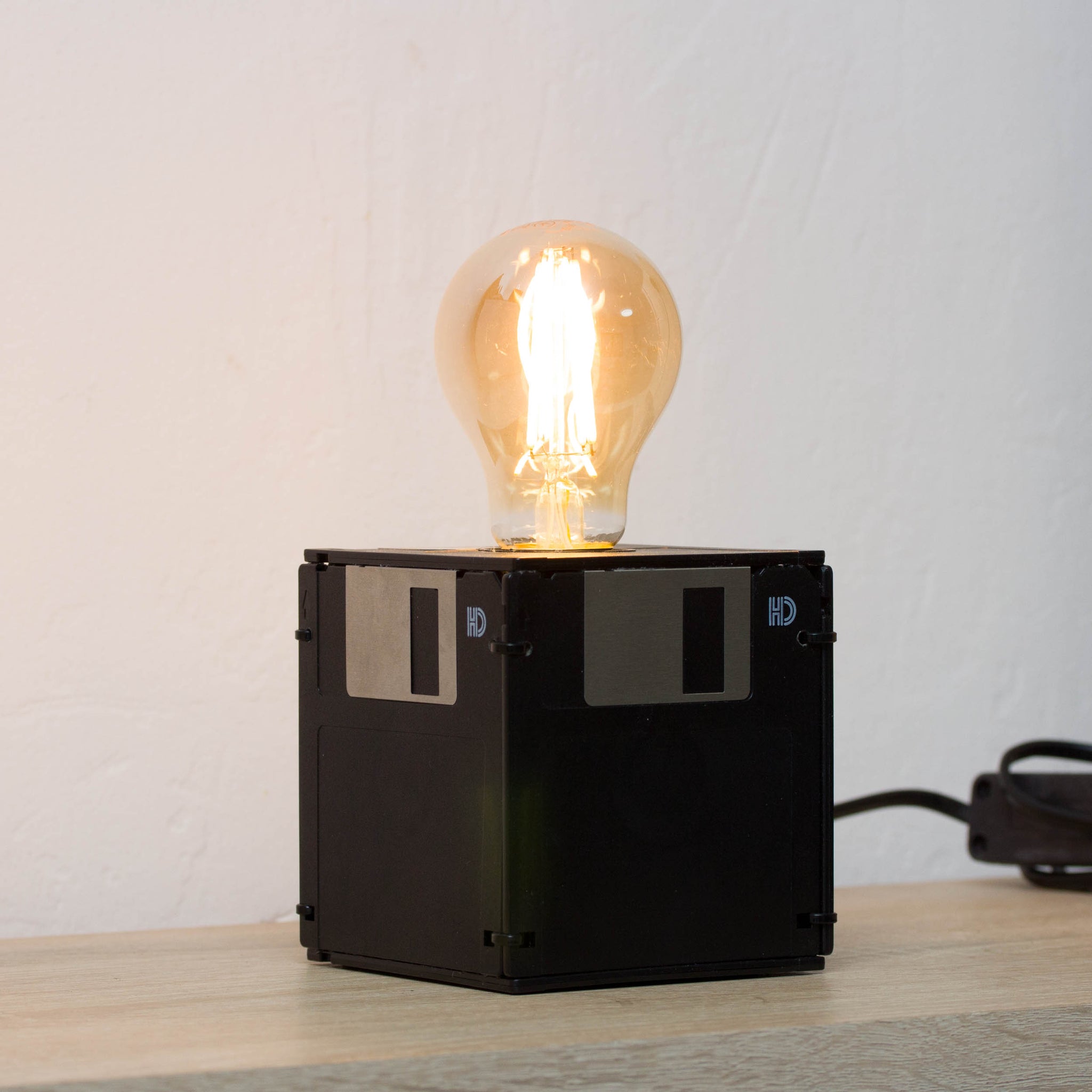 Table lamp made with recycled floppy disks
