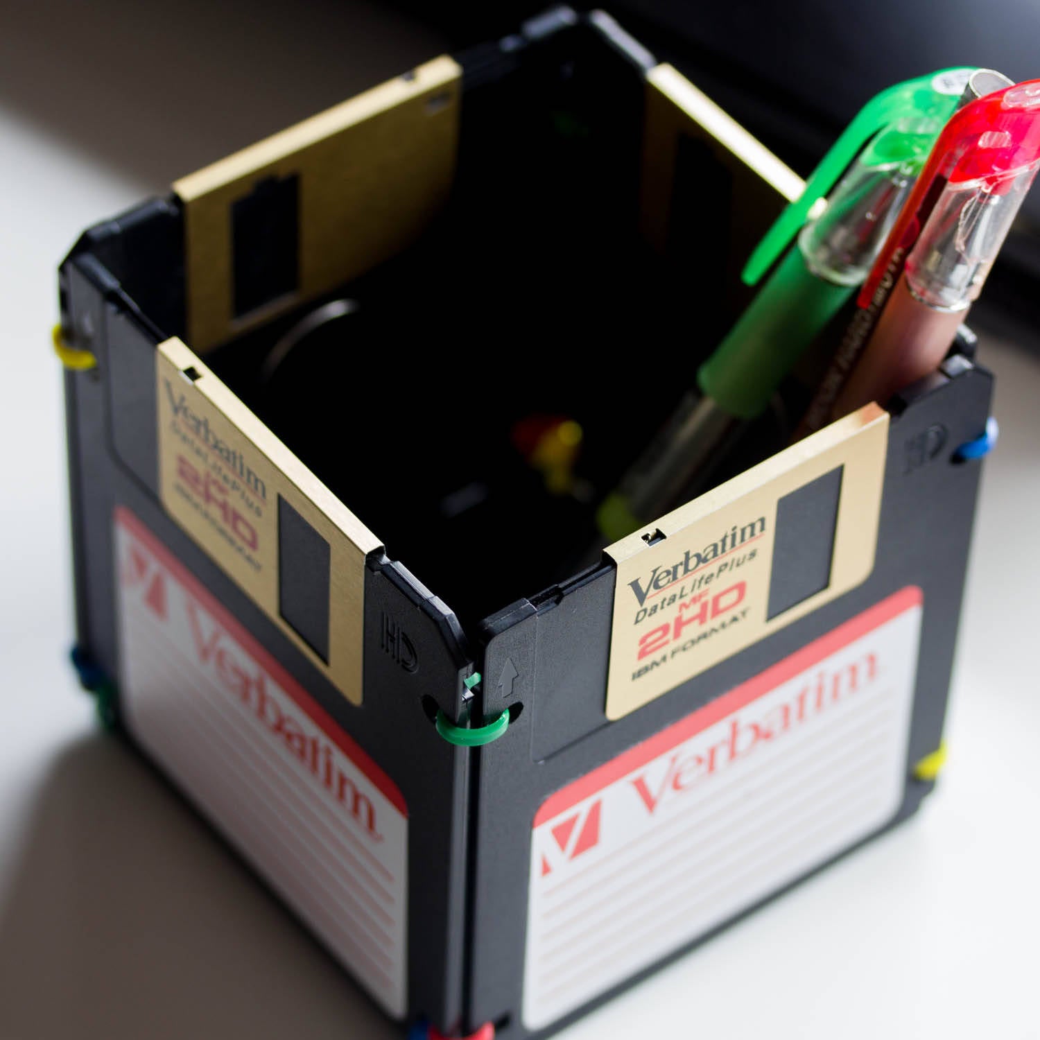 Pen and Pencil Holder made with recycled Verbatim floppy discs - black and golden