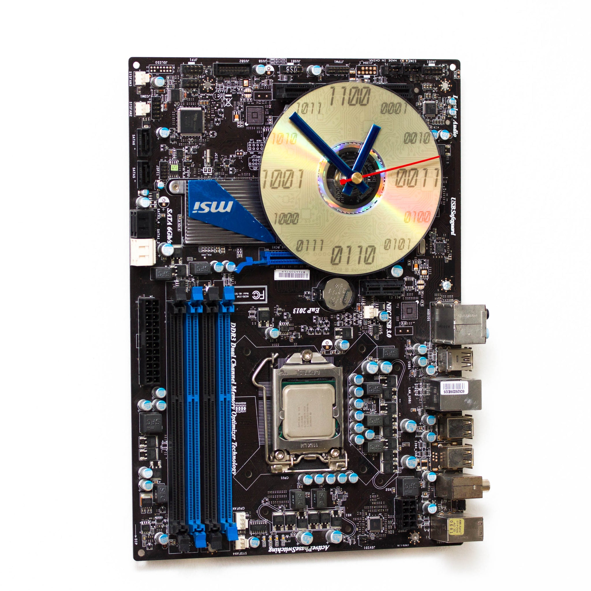 Wall clock made of dark brown circuit board with bright blue details