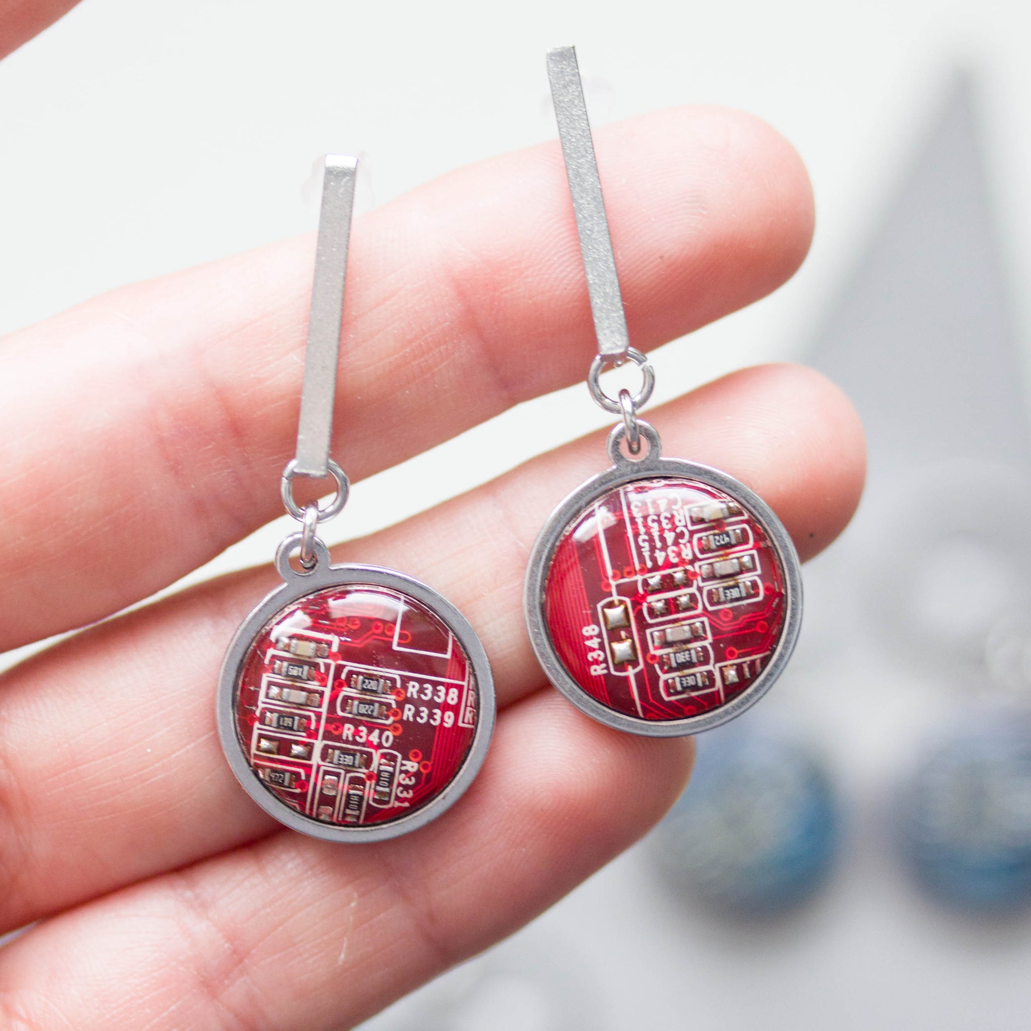 Stud earrings with 15mm round circuit board pendants, steel wires