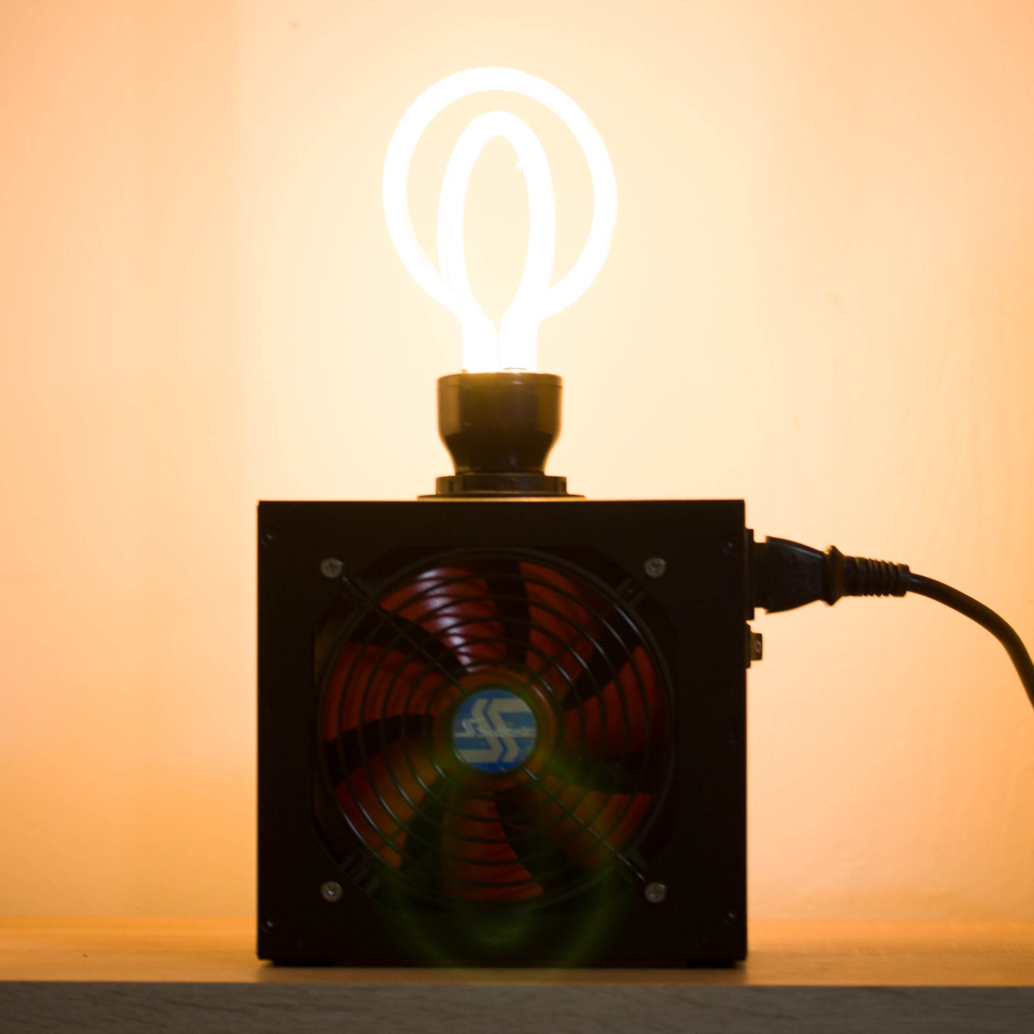Table lamp made with recycled computer power supply unit