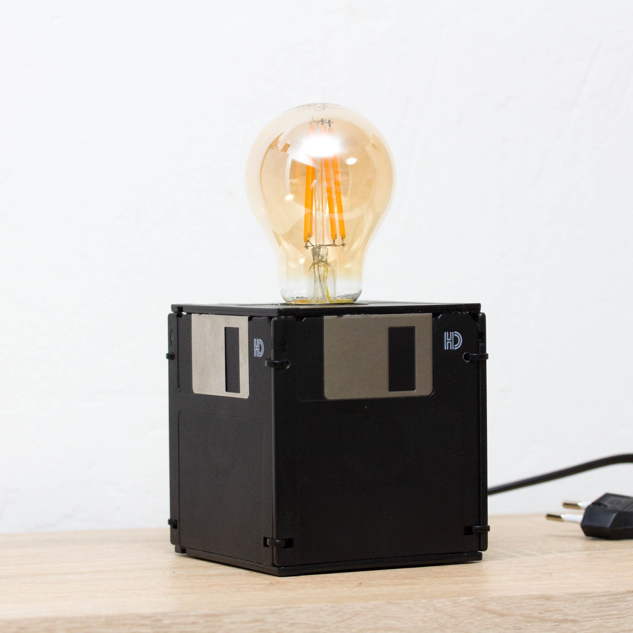 Table lamp made with recycled floppy disks