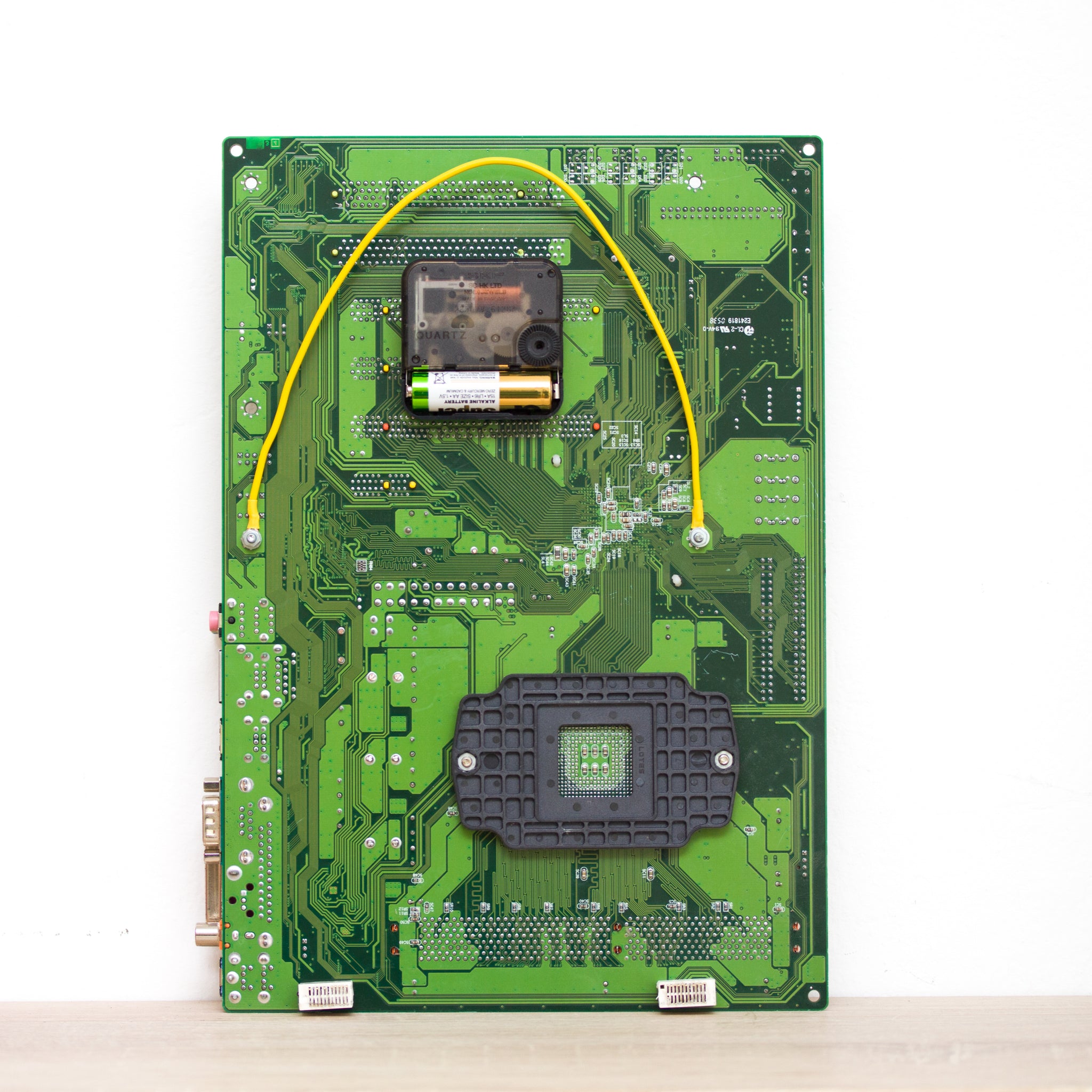 Geeky Wall Clock made of green circuit board