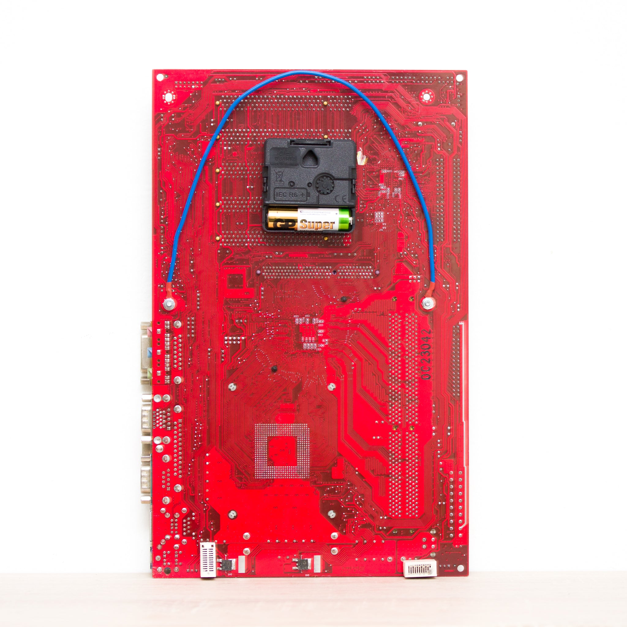 Geeky Wall Clock made of red Circuit Board