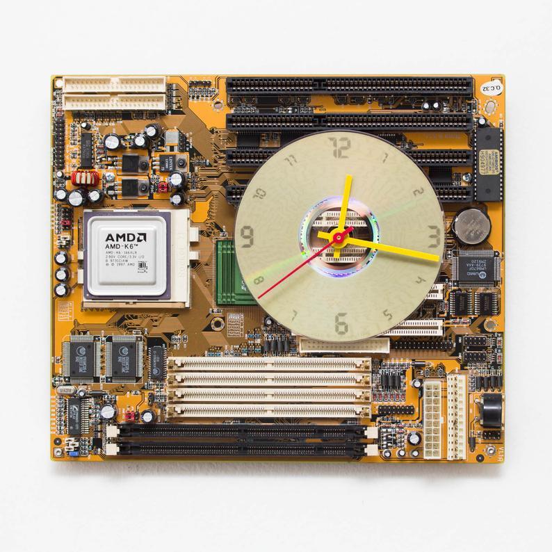 Geeky Wall Clock made of recycled yellow / olive green Circuit Board