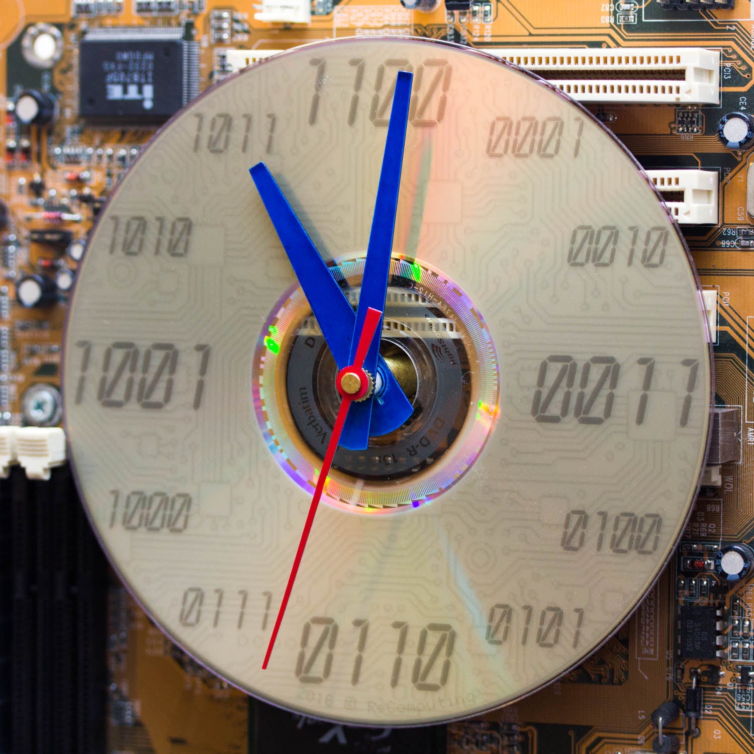 Techie Clock made of yellow / olive green circuit board