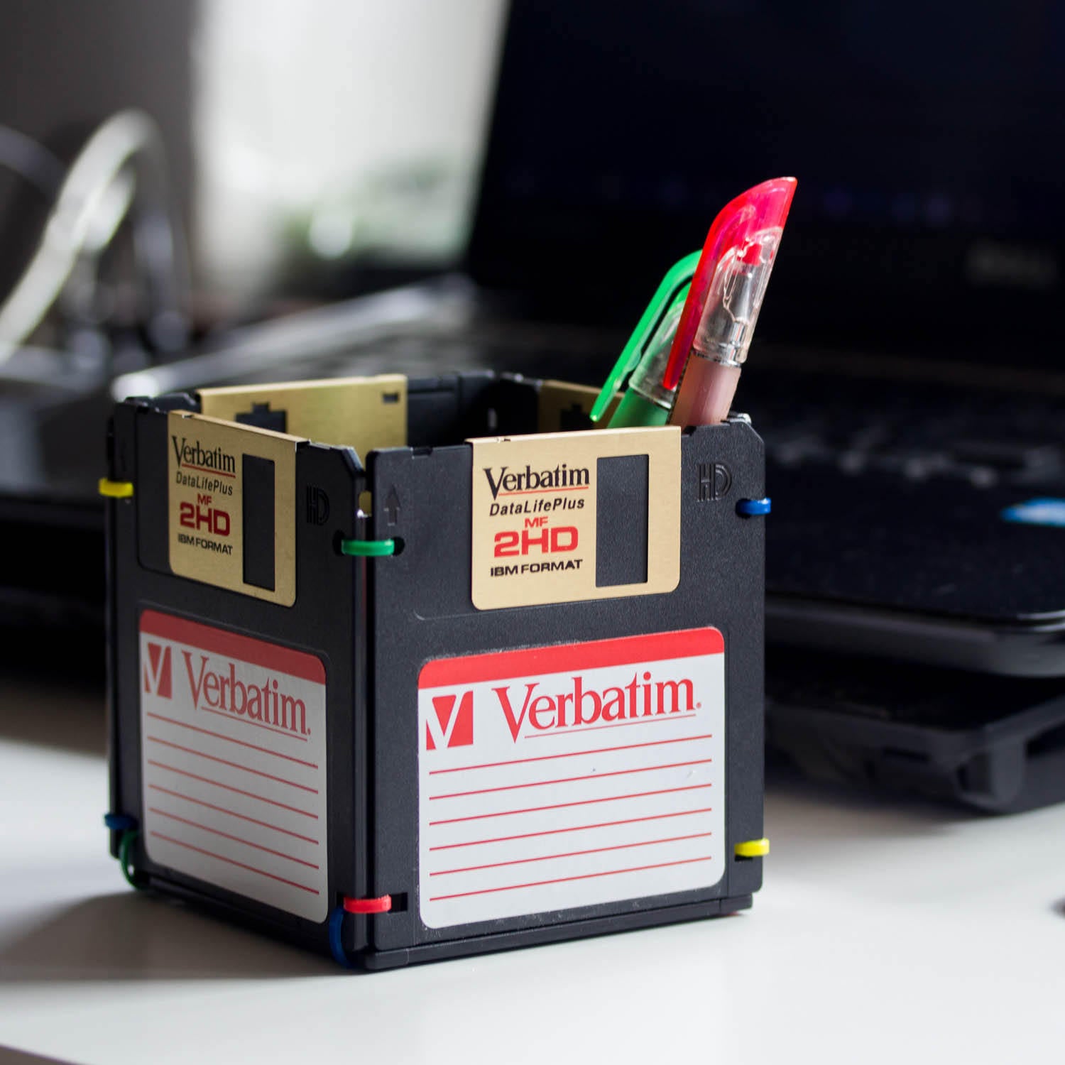Pen and Pencil Holder made with recycled Verbatim floppy discs - black and golden